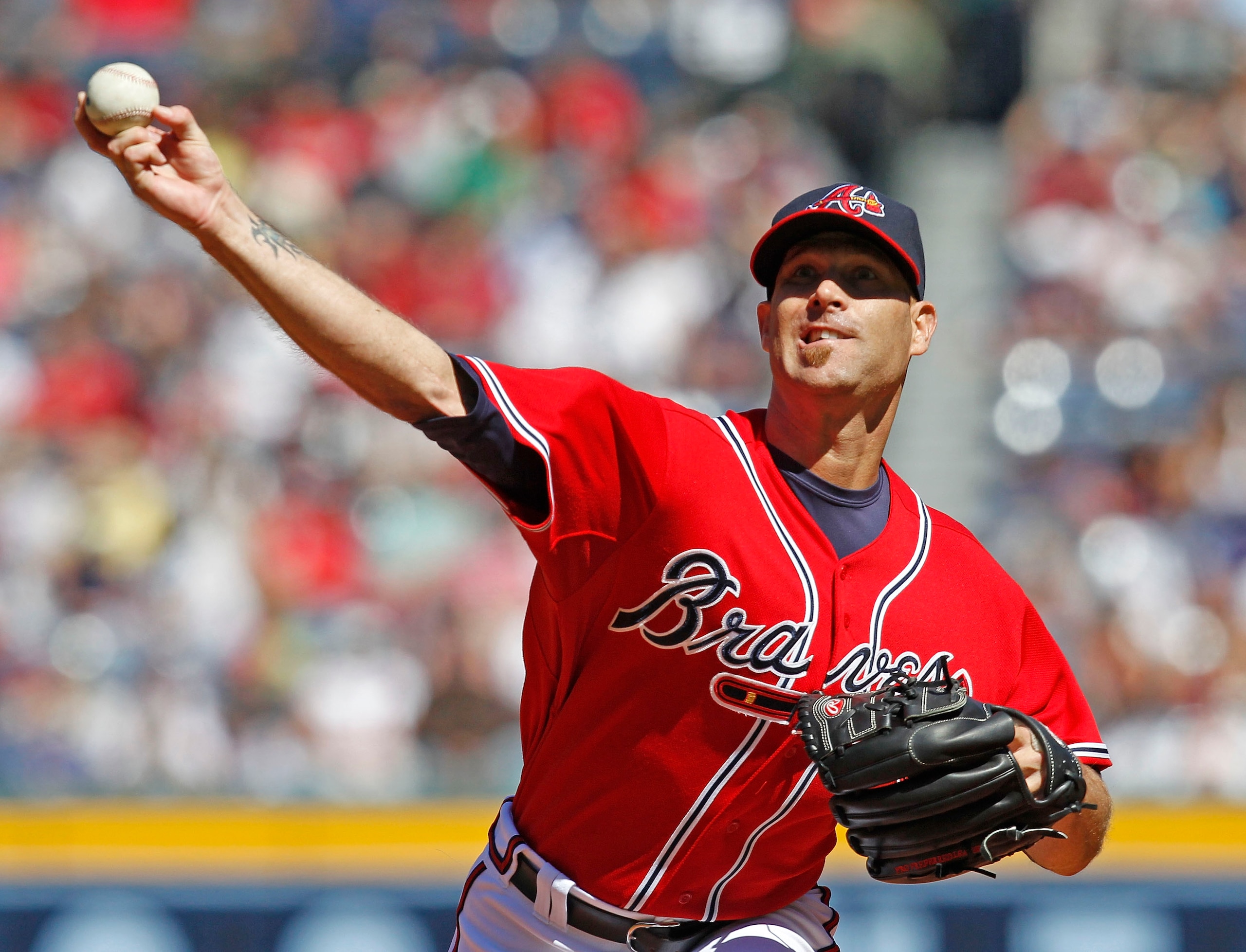 ATLANTA - OCTOBER 3:  Pitcher Tim Hudson #15 of the Atlanta Braves throws a pitch during the game against the Philadelphia Phillies at Turner Field on October 3, 2010 in Atlanta, Georgia.  The Braves beat the Phillies 8-7.  (Photo by Mike Zarrilli/Getty I