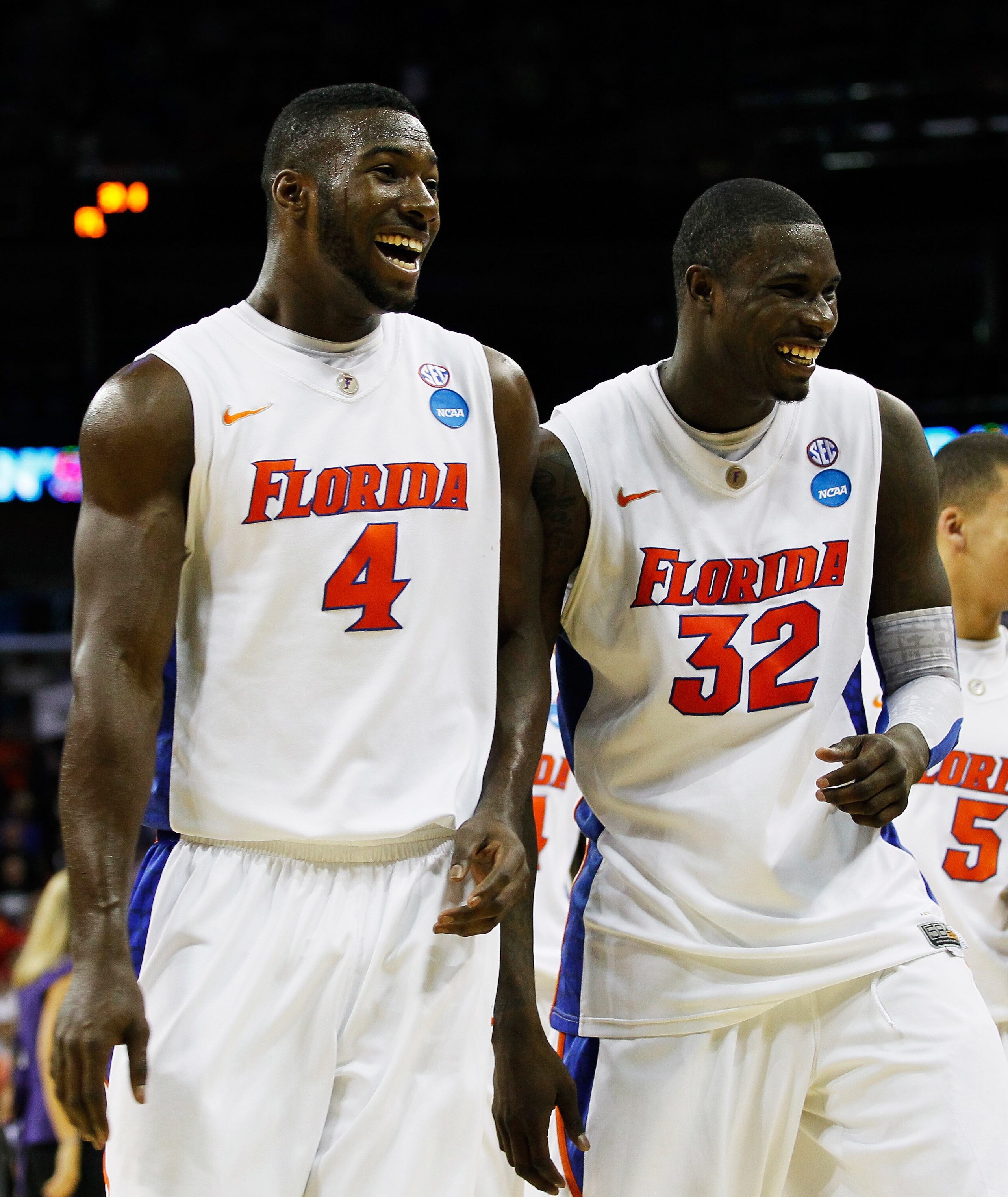 NEW ORLEANS, LA - MARCH 24:  Patric Young #4 and Vernon Macklin #32 of the Florida Gators celebrate durig their 83 to 74 win over the Brigham Young Cougars during the Southeast regional of the 2011 NCAA men's basketball tournament at New Orleans Arena on