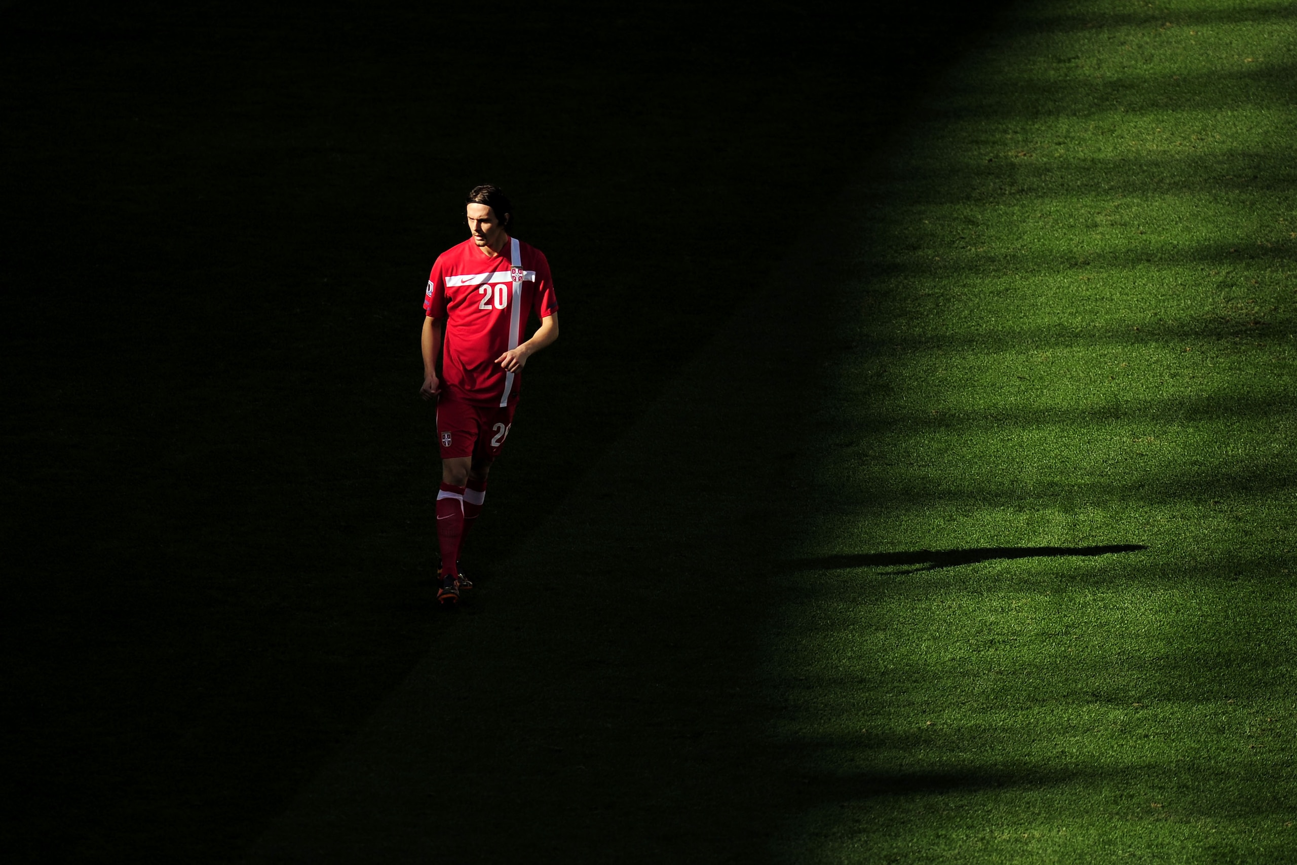 PORT ELIZABETH, SOUTH AFRICA - JUNE 18:  Neven Subotic of Serbia look on during the 2010 FIFA World Cup South Africa Group D match between Germany and Serbia at Nelson Mandela Bay Stadium on June 18, 2010 in Port Elizabeth, South Africa.  (Photo by Clive