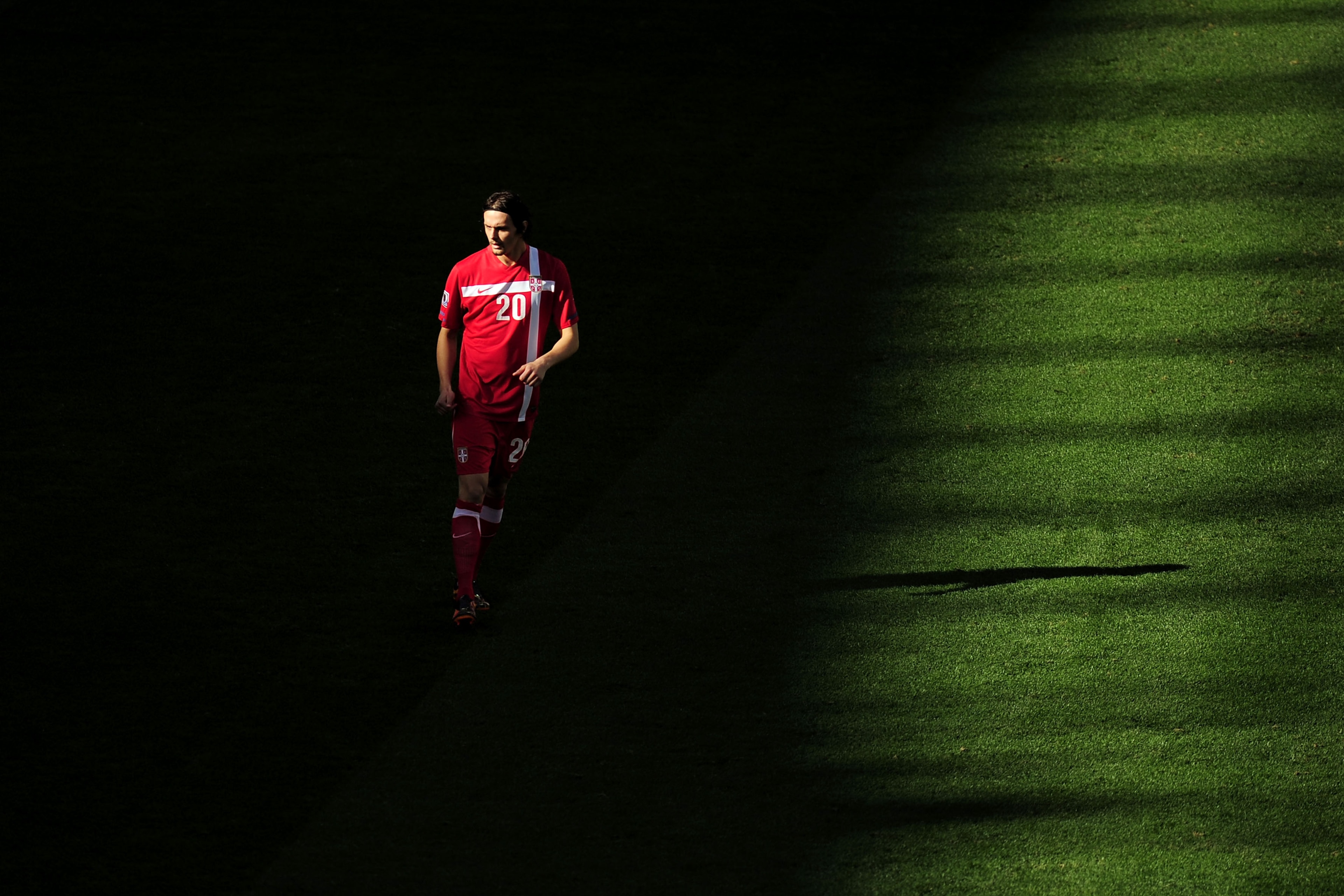 PORT ELIZABETH, SOUTH AFRICA - JUNE 18: Neven Subotic of Serbia look on during the 2010 FIFA World Cup South Africa Group D match between Germany and Serbia at Nelson Mandela Bay Stadium on June 18, 2010 in Port Elizabeth, South Africa. (Photo by Clive PORT ELIZABETH, SOUTH AFRICA - JUNE 18: Neven Subotic of Serbia look on during the 2010 FIFA World Cup South Africa Group D match between Germany and Serbia at Nelson Mandela Bay Stadium on June 18, 2010 in Port Elizabeth, South Africa. (Photo by Clive