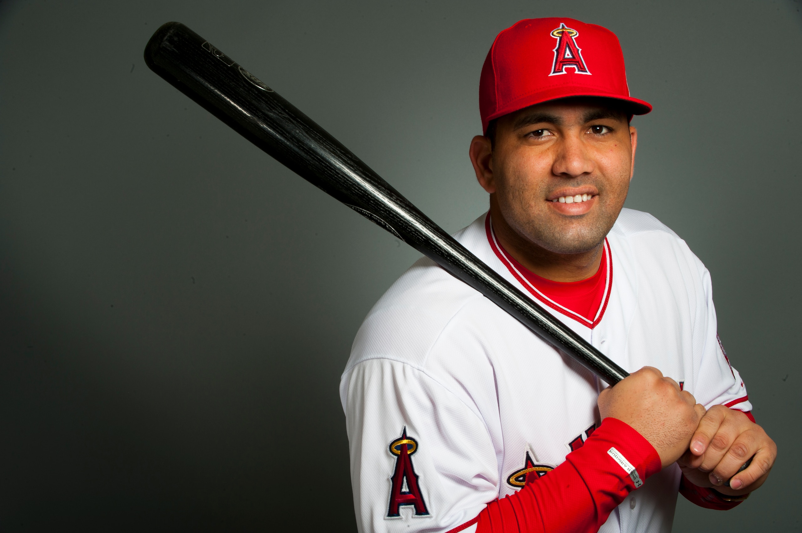 TEMPE, AZ - FEBRUARY 21: Kendry Morales #8 of the Los Angeles Angels of Anaheim poses during their photo day at Tempe Diablo Stadium on February 21, 2011 in Tempe, Arizona.  (Photo by Rob Tringali/Getty Images)