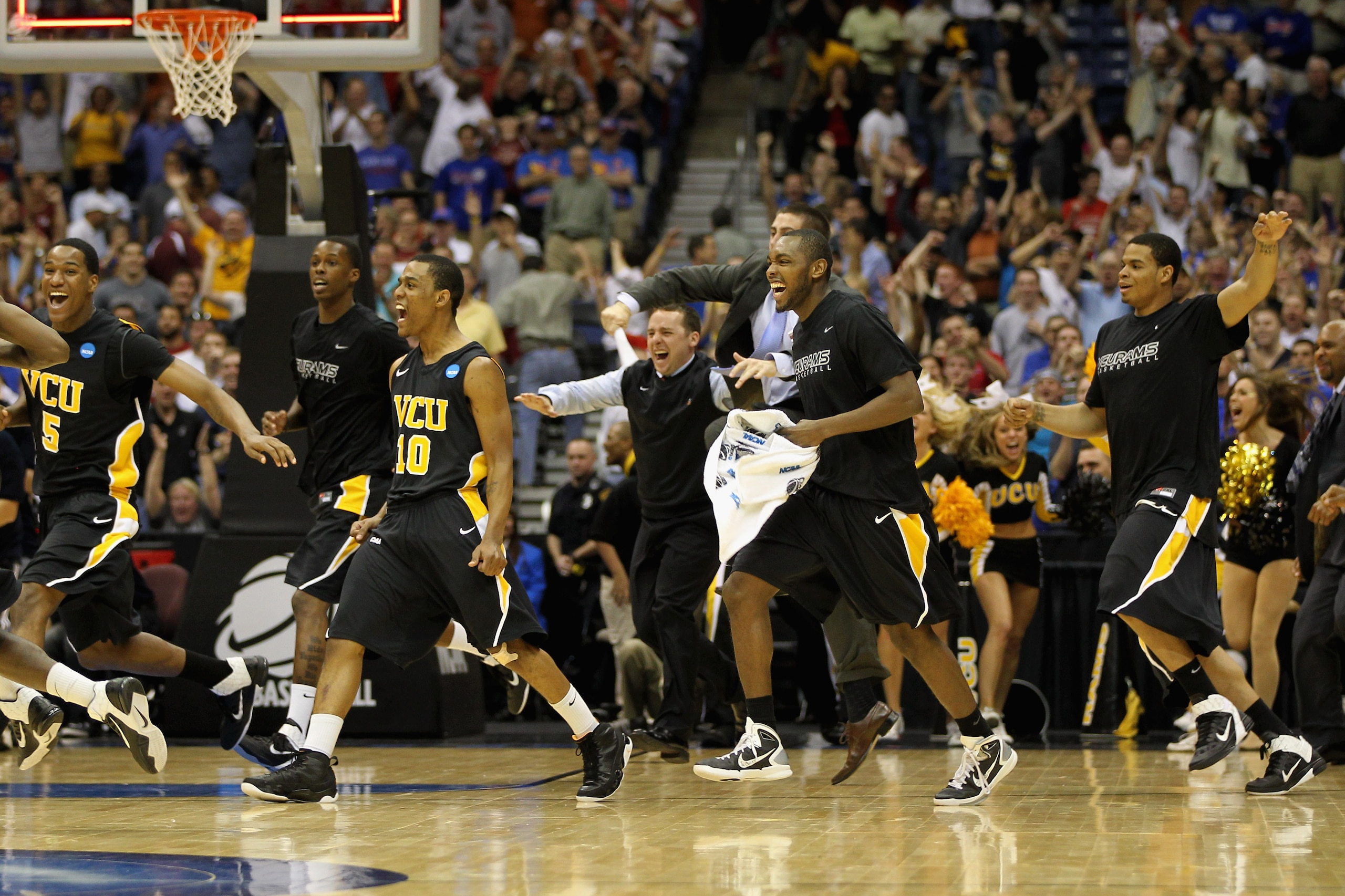 SAN ANTONIO, TX - MARCH 25:  The Virginia Commonwealth Rams celebrate after defeating the Florida State Seminoles during the southwest regional of the 2011 NCAA men's basketball tournament at the Alamodome on March 25, 2011 in San Antonio, Texas.  (Photo
