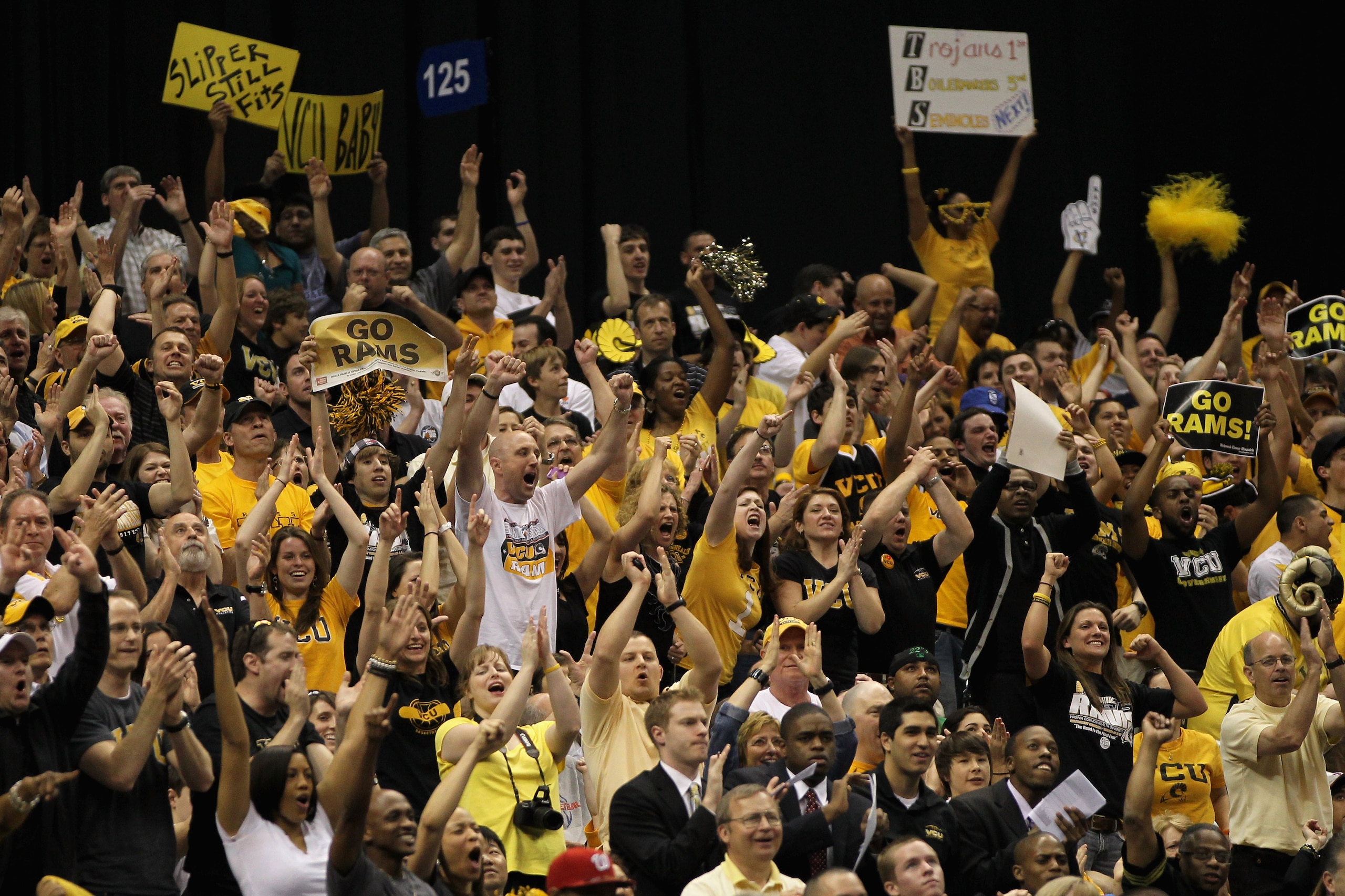 SAN ANTONIO, TX - MARCH 25:  Fans of the Virginia Commonwealth Rams cheer during the southwest regional of the 2011 NCAA men's basketball tournament against the Florida State Seminoles at the Alamodome on March 25, 2011 in San Antonio, Texas.  (Photo by J