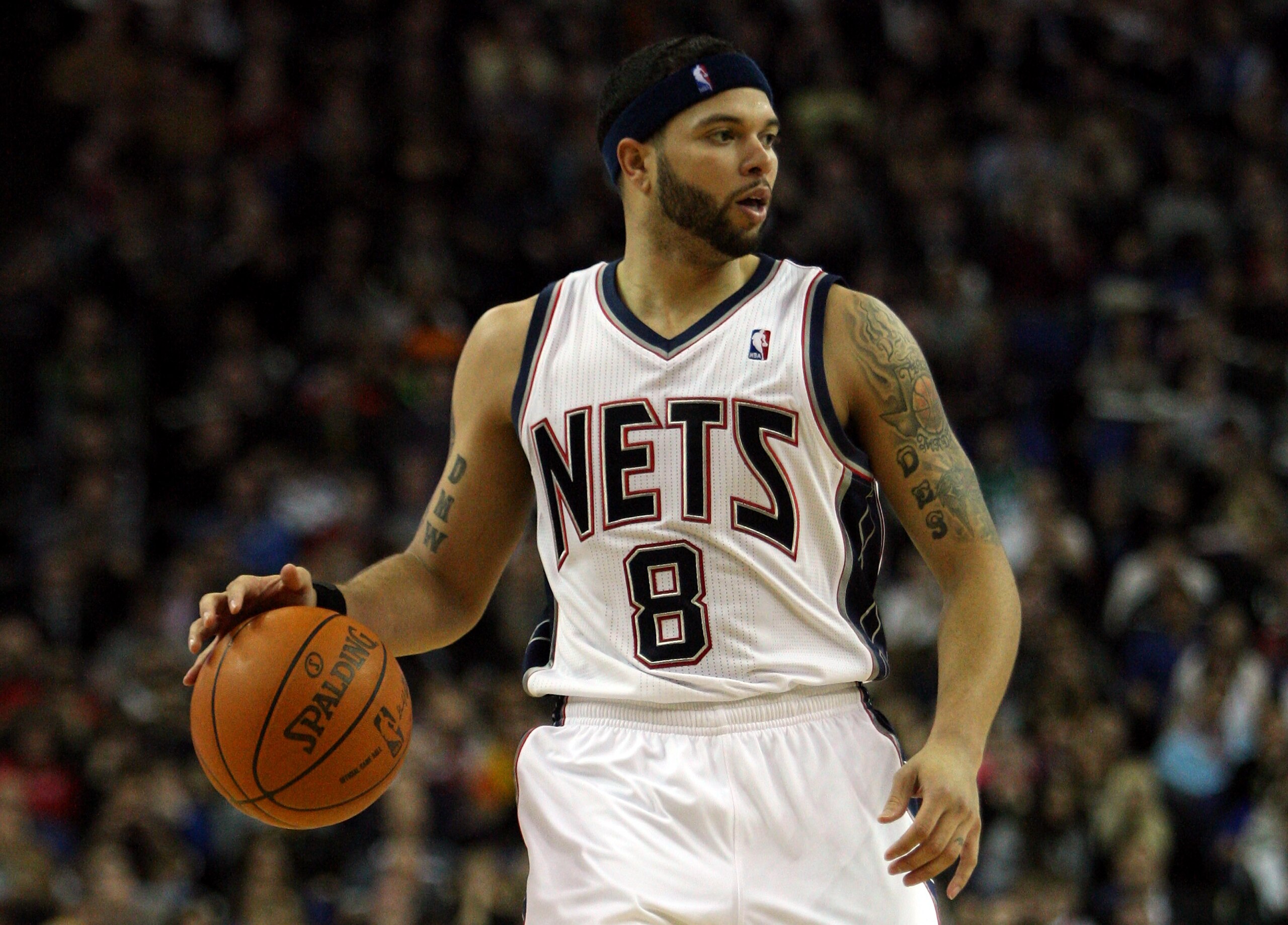 LONDON, ENGLAND - MARCH 04: #8 Deron Williams of the Nets in action during the NBA match between New Jersey Nets and the Toronto Raptors at the O2 Arena on March 4, 2011 in London, England. NOTE TO USER: User expressly acknowledges and agrees that, by do LONDON, ENGLAND - MARCH 04: #8 Deron Williams of the Nets in action during the NBA match between New Jersey Nets and the Toronto Raptors at the O2 Arena on March 4, 2011 in London, England. NOTE TO USER: User expressly acknowledges and agrees that, by do