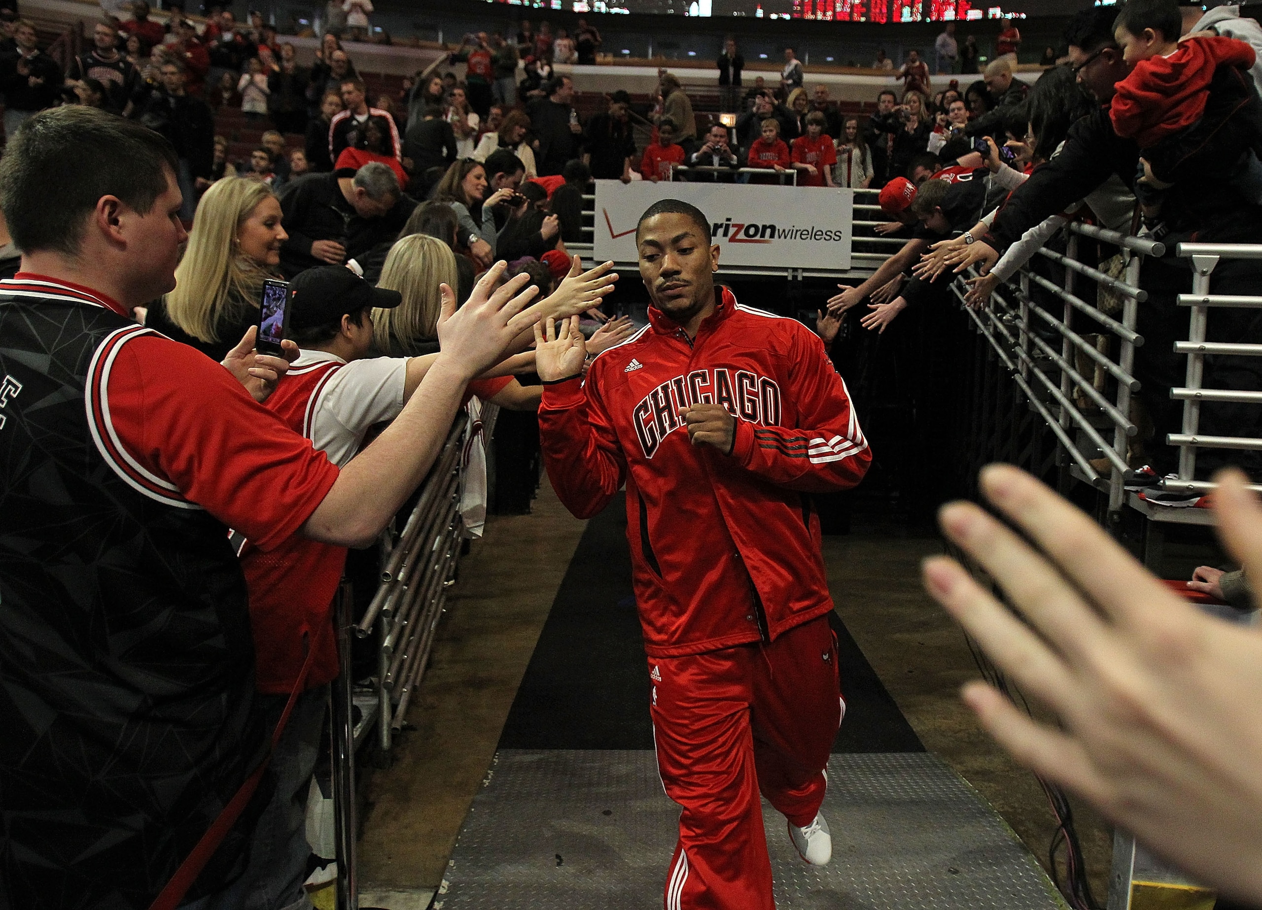 CHICAGO, IL - MARCH 25: Derrick Rose #1 of the Chicago Bulls runs to the court before a game against the Memphis Girzzlies at the United Center on March 25, 2011 in Chicago, Illinois. Rose will donate $1,000.00 for every point he scored tonight to the Dir CHICAGO, IL - MARCH 25: Derrick Rose #1 of the Chicago Bulls runs to the court before a game against the Memphis Girzzlies at the United Center on March 25, 2011 in Chicago, Illinois. Rose will donate $1,000.00 for every point he scored tonight to the Dir