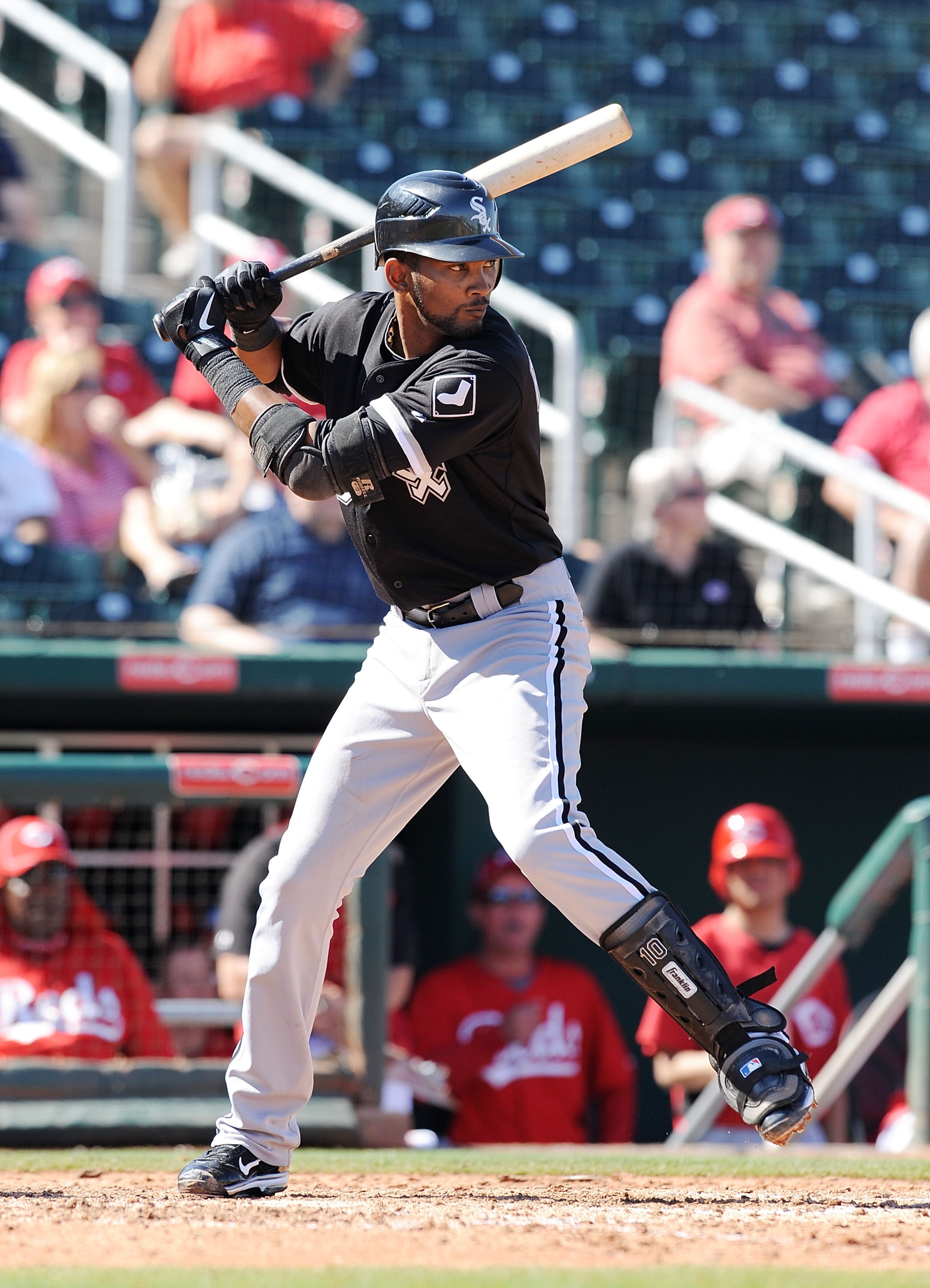GOODYEAR, AZ - MARCH 02:  Alexi Ramirez #10 of the Chicago White Sox gets ready in the batters box against the Cincinnati Reds during a spring training game at Goodyear Ballpark on March 2, 2011 in Goodyear, Arizona.  (Photo by Norm Hall/Getty Images)