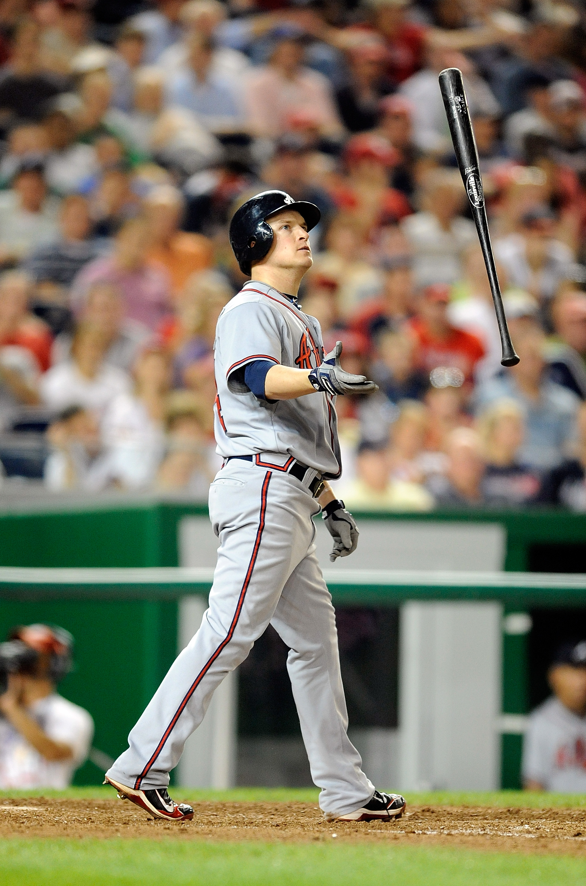 WASHINGTON - SEPTEMBER 24:  Nate McLouth #24 of the Atlanta Braves tosses his bat after striking out against the Washington Nationals at Nationals Park on September 24, 2010 in Washington, DC.  (Photo by Greg Fiume/Getty Images)