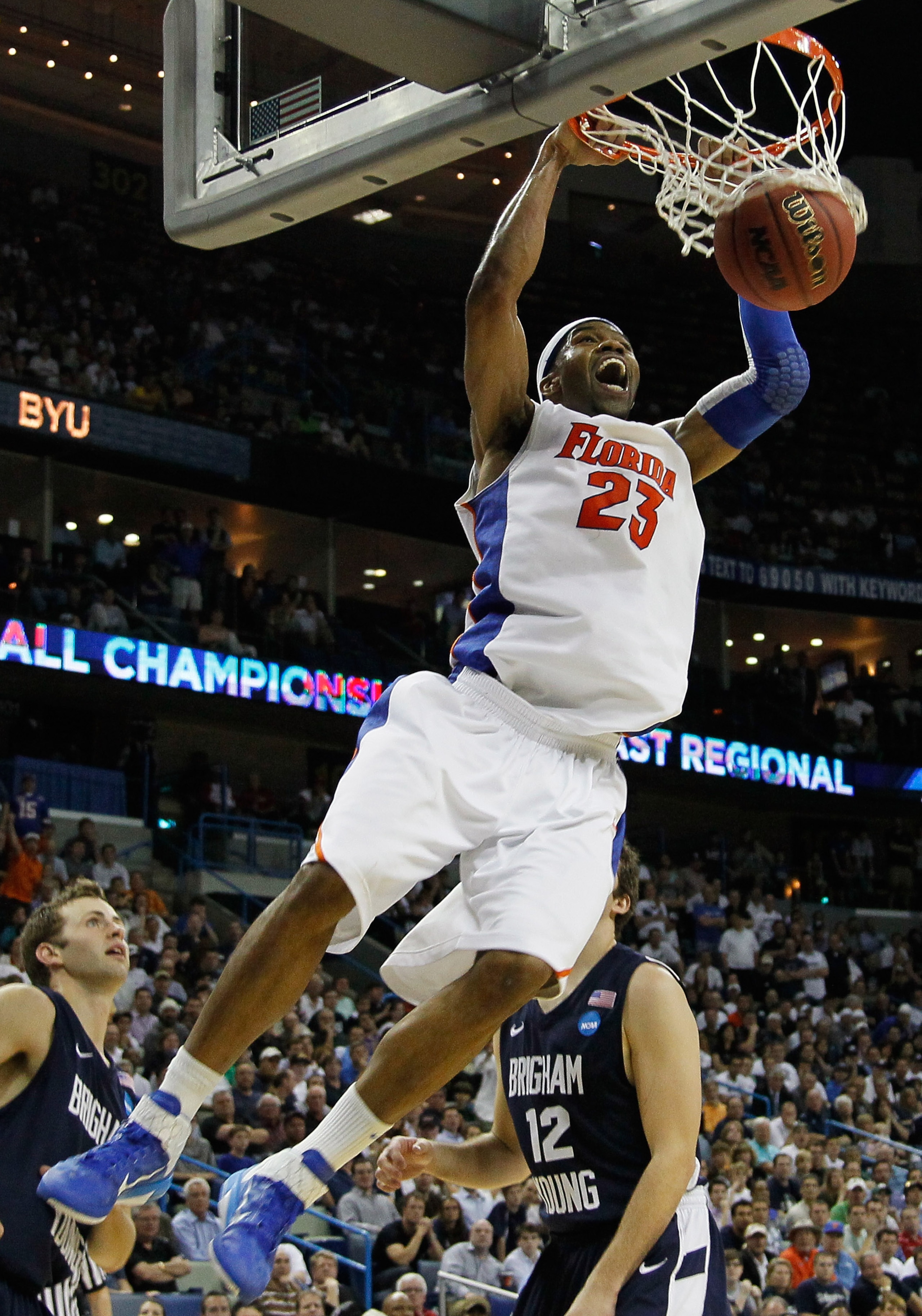 NEW ORLEANS, LA - MARCH 24: Alex Tyus #23 of the Florida Gators dunks during their 83 to 74 win over the Brigham Young Cougars in the Southeast regional of the 2011 NCAA men's basketball tournament at New Orleans Arena on March 24, 2011 in New Orleans, L NEW ORLEANS, LA - MARCH 24: Alex Tyus #23 of the Florida Gators dunks during their 83 to 74 win over the Brigham Young Cougars in the Southeast regional of the 2011 NCAA men's basketball tournament at New Orleans Arena on March 24, 2011 in New Orleans, L