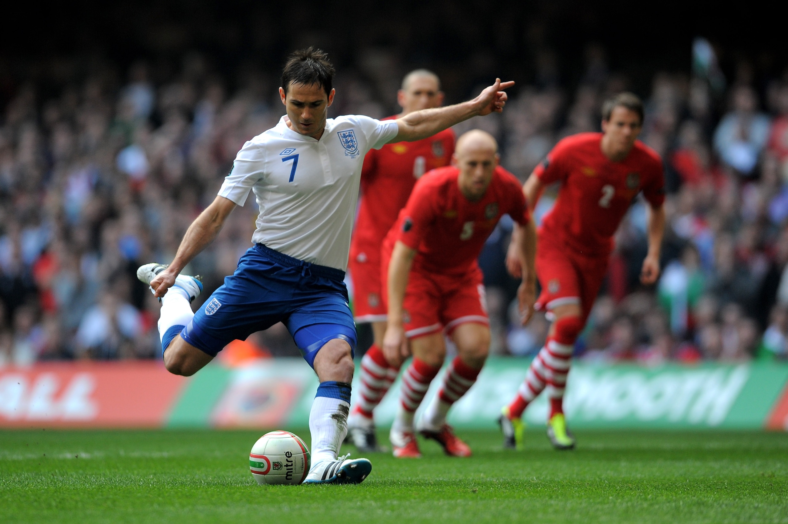 CARDIFF, WALES - MARCH 26:  Frank Lampard of England scores the opening goal from the penalty spot during the UEFA EURO 2012 Group G qualifying match between Wales and England at the Millennium Stadium on March 26, 2011 in Cardiff, Wales.  (Photo by Micha