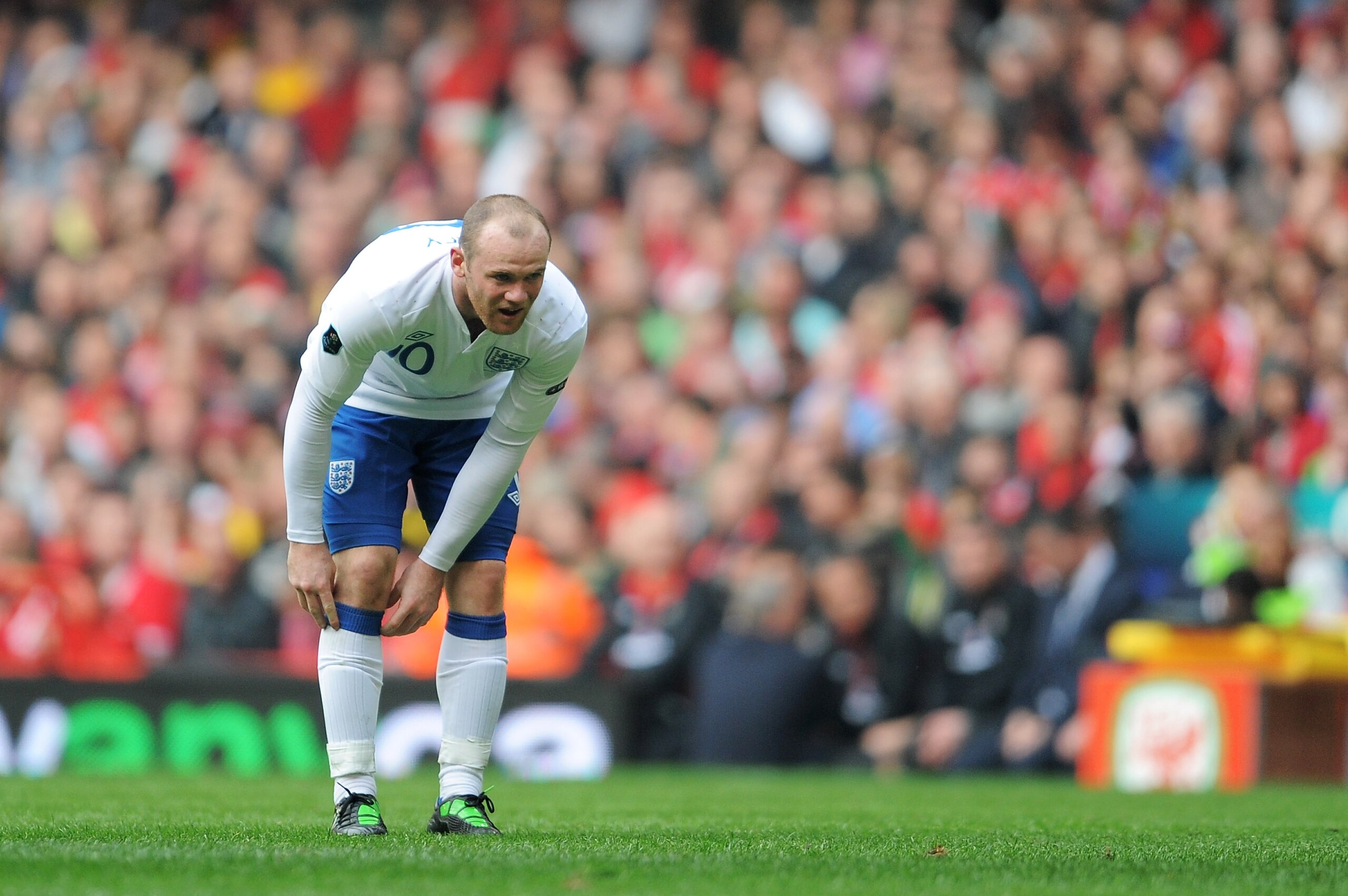 CARDIFF, WALES - MARCH 26:  Wayne Rooney of England looks dejected during the UEFA EURO 2012 Group G qualifying match between Wales and England at the Millennium Stadium on March 26, 2011 in Cardiff, Wales.  (Photo by Michael Regan/Getty Images)