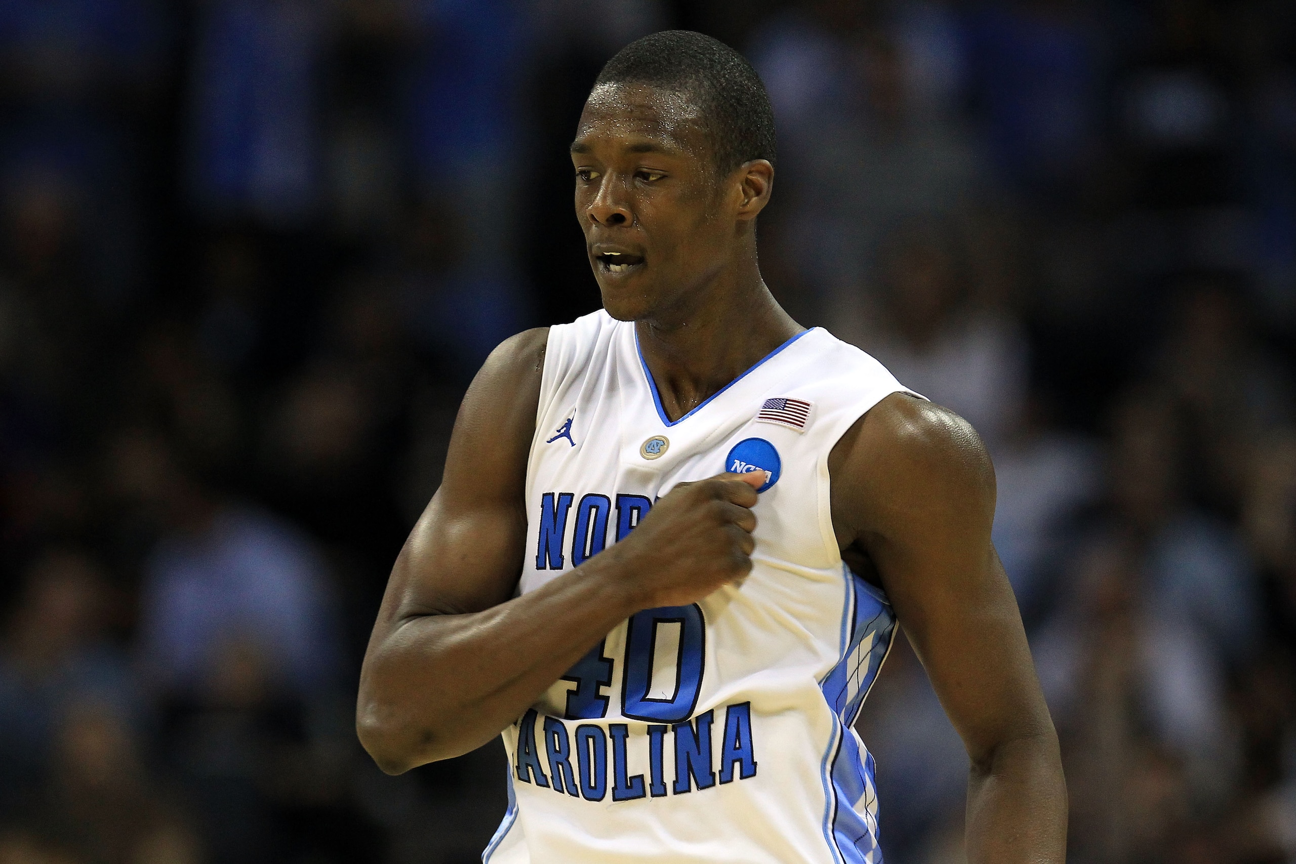 CHARLOTTE, NC - MARCH 20:  Harrison Barnes #40 of the North Carolina Tar Heels reacts in the second half while taking on the Washington Huskies during the third round of the 2011 NCAA men's basketball tournament at Time Warner Cable Arena on March 20, 201