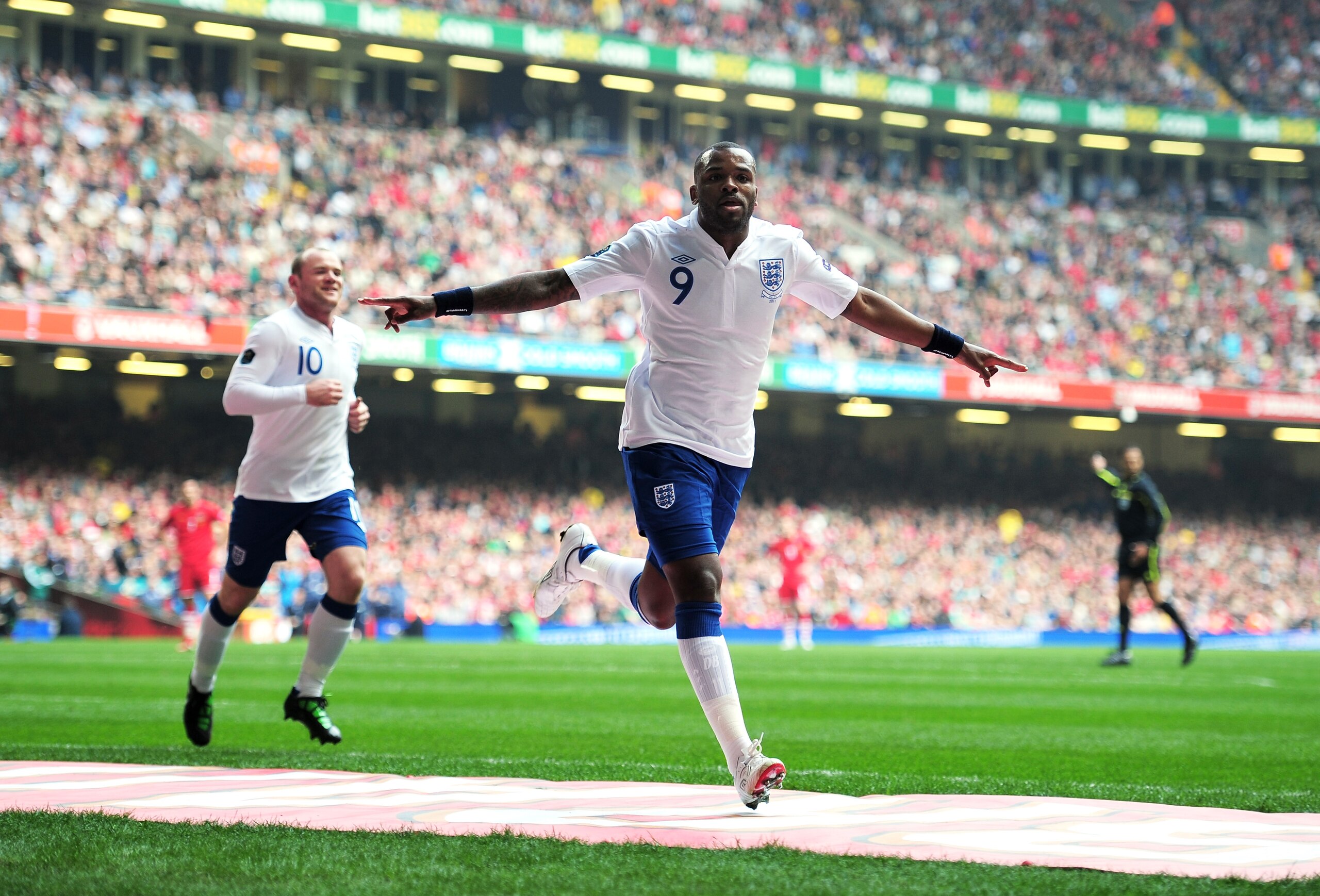 CARDIFF, WALES - MARCH 26:  Darren Bent of England celebrates after scoring his team's second goal during the UEFA EURO 2012 Group G qualifying match between Wales and England at the Millennium Stadium on March 26, 2011 in Cardiff, Wales.  (Photo by Shaun