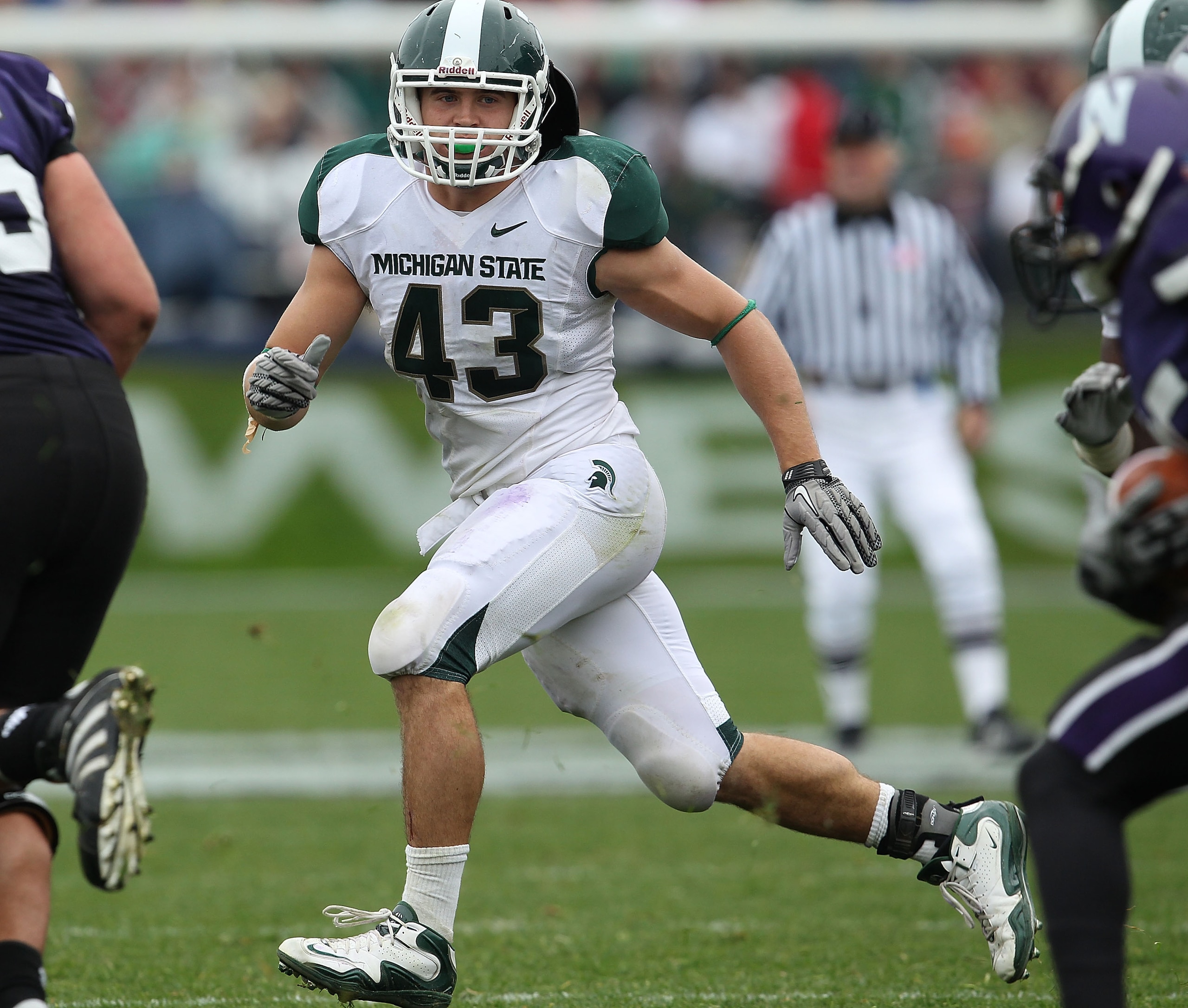 EVANSTON, IL - OCTOBER 23: Eric Gordon #43 of the Michigan State Spartans follows a play against the Northwestern Wildcats at Ryan Field on October 23, 2010 in Evanston, Illinois. Michigan State defeated Northwestern 35-27. (Photo by Jonathan Daniel/Getty EVANSTON, IL - OCTOBER 23: Eric Gordon #43 of the Michigan State Spartans follows a play against the Northwestern Wildcats at Ryan Field on October 23, 2010 in Evanston, Illinois. Michigan State defeated Northwestern 35-27. (Photo by Jonathan Daniel/Getty