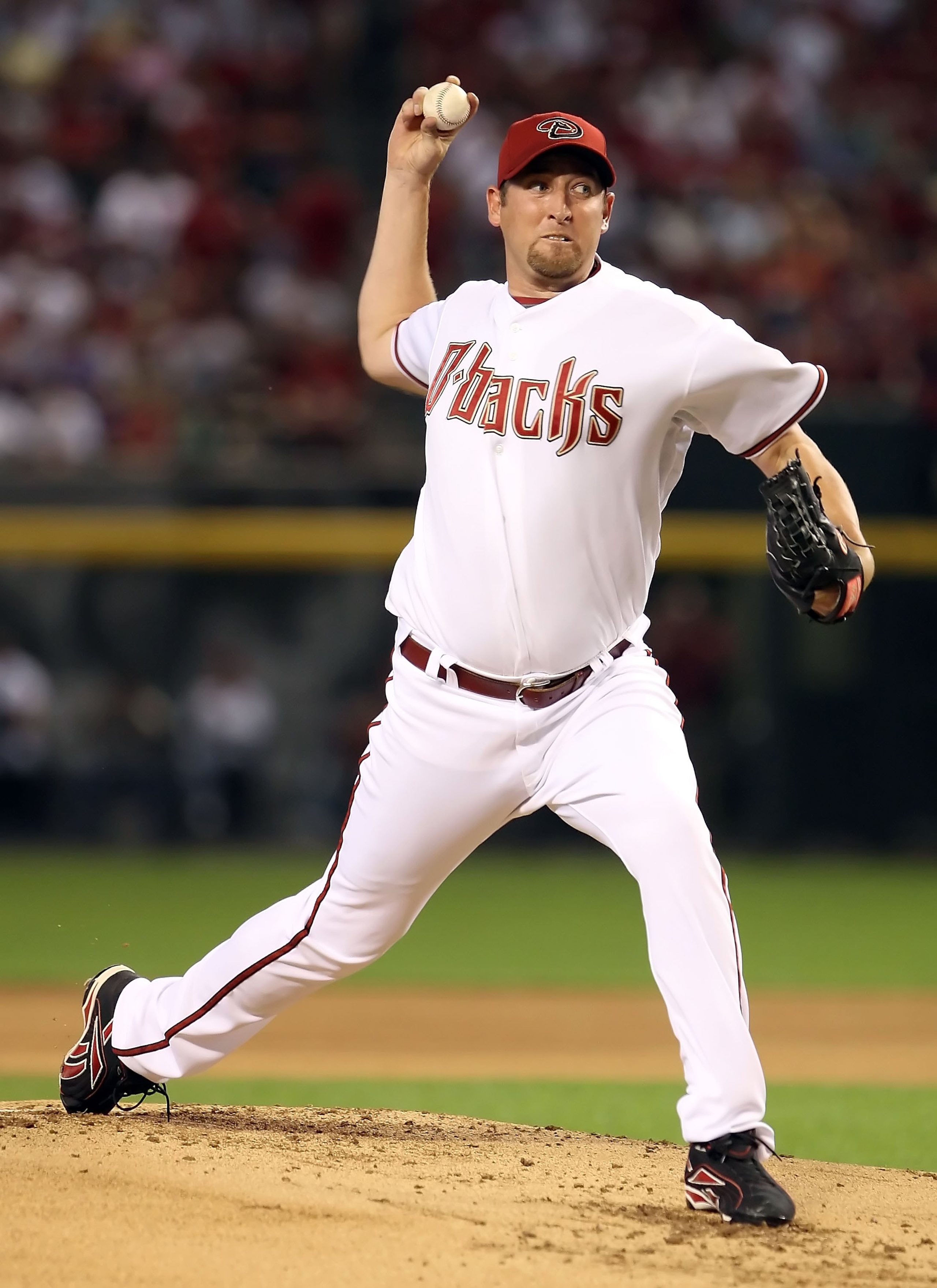 PHOENIX - APRIL 06:  Starting pitcher Brandon Webb #17 of the Arizona Diamondbacks pitches against the Colorado Rockies during the MLB openning day game at Chase Field on April 6, 2009 in Phoenix, Arizona.  The Diamondbacks defeated the Rockies 9-8.  (Pho