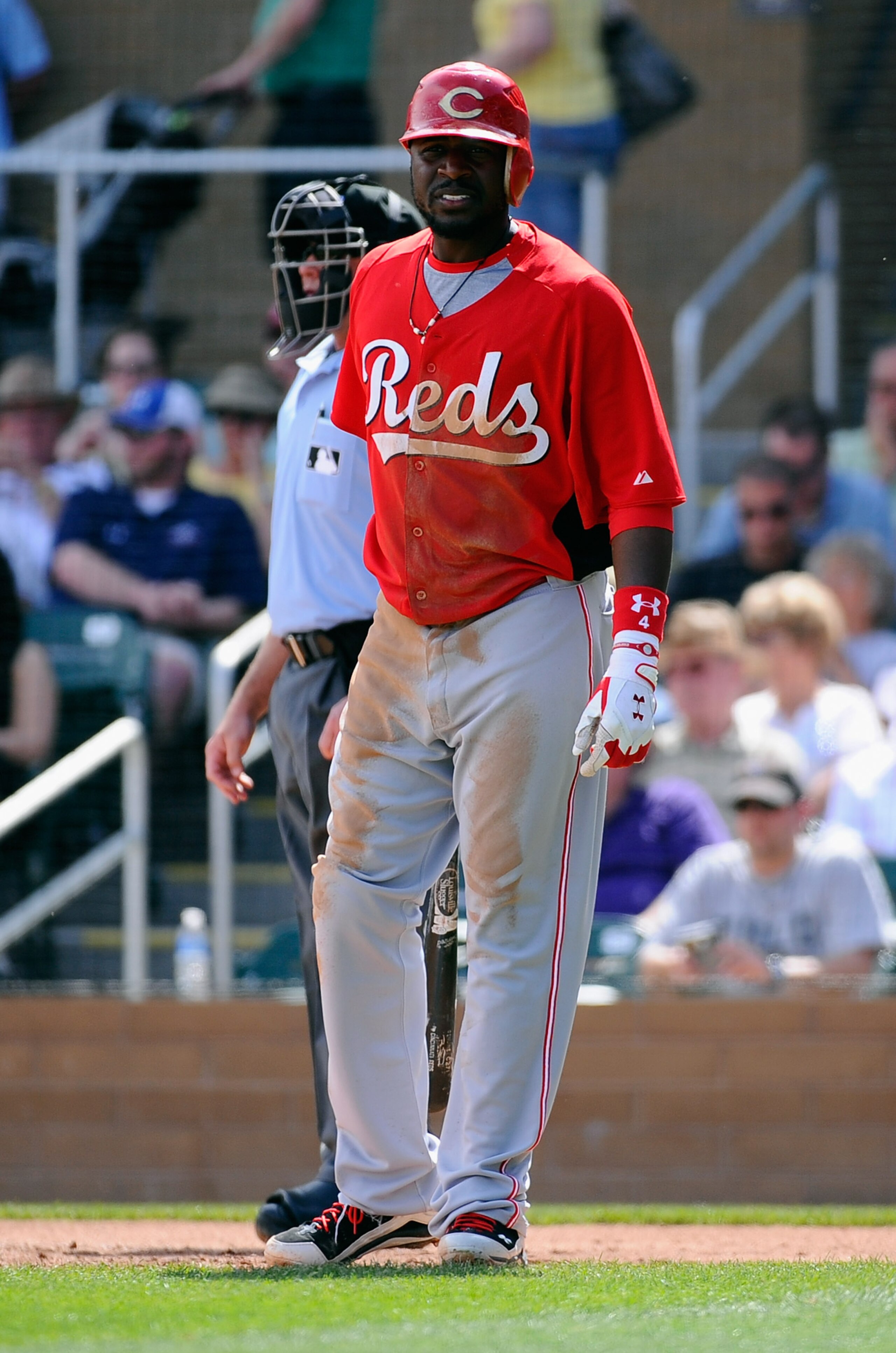 SCOTTSDALE, AZ - MARCH 14:  Brandon Phillips #4 of the Cincinnati Reds against the Colorodo Rockies during the spring training baseball game at Salt River Fields at Talking Stick on March 14, 2011 in Scottsdale, Arizona.  (Photo by Kevork Djansezian/Getty