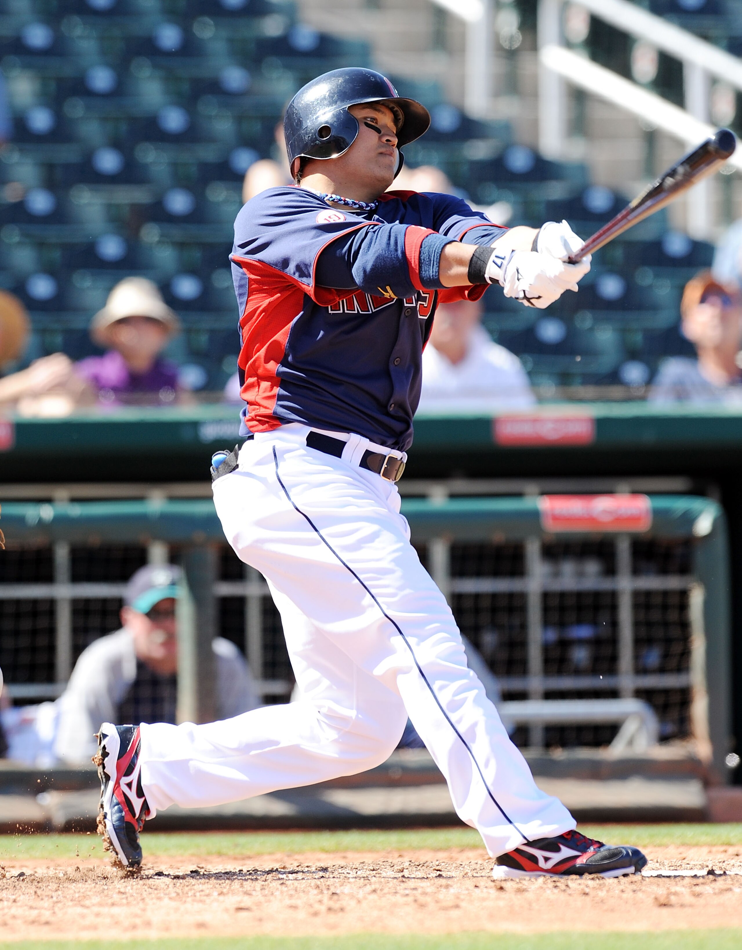 GOODYEAR, AZ - MARCH 11:  Shin-Soo Choo #17 of the Cleveland Indians follows through on a swing against the Seattle Mariners at Goodyear Ballpark on March 11, 2011 in Goodyear, Arizona.  (Photo by Norm Hall/Getty Images)