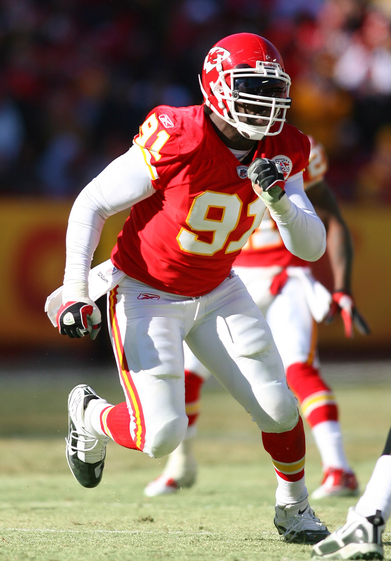 KANSAS CITY, MO - JANUARY 02:  Linebacker Tamba Hali #91 of the Kansas City Chiefs rushes the quarterback in a game against the Oakland Raiders at Arrowhead Stadium on January 2, 2011 in Kansas City, Missouri.  (Photo by Tim Umphrey/Getty Images)