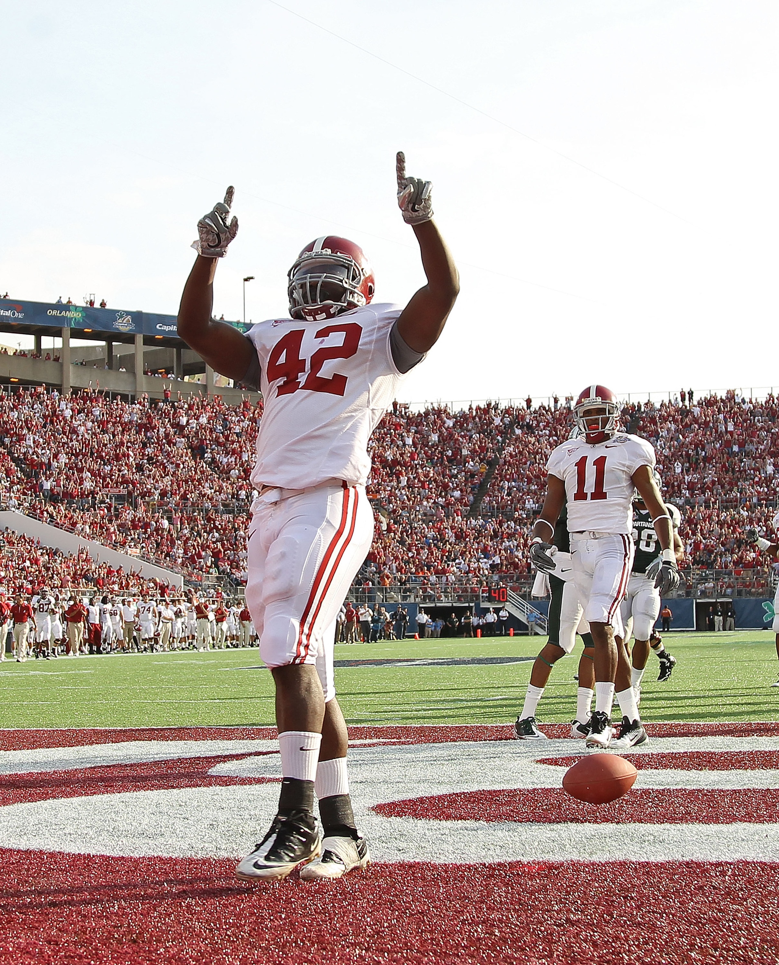 ORLANDO, FL - JANUARY 01: Eddie Lacy #42 of the Alabama Crimson Tide celebrates after rushing for a touchdown during the Capitol One Bowl against the Michigan State Spartans at the Florida Citrus Bowl on January 1, 2011 in Orlando, Florida. (Photo by Mi ORLANDO, FL - JANUARY 01: Eddie Lacy #42 of the Alabama Crimson Tide celebrates after rushing for a touchdown during the Capitol One Bowl against the Michigan State Spartans at the Florida Citrus Bowl on January 1, 2011 in Orlando, Florida. (Photo by Mi