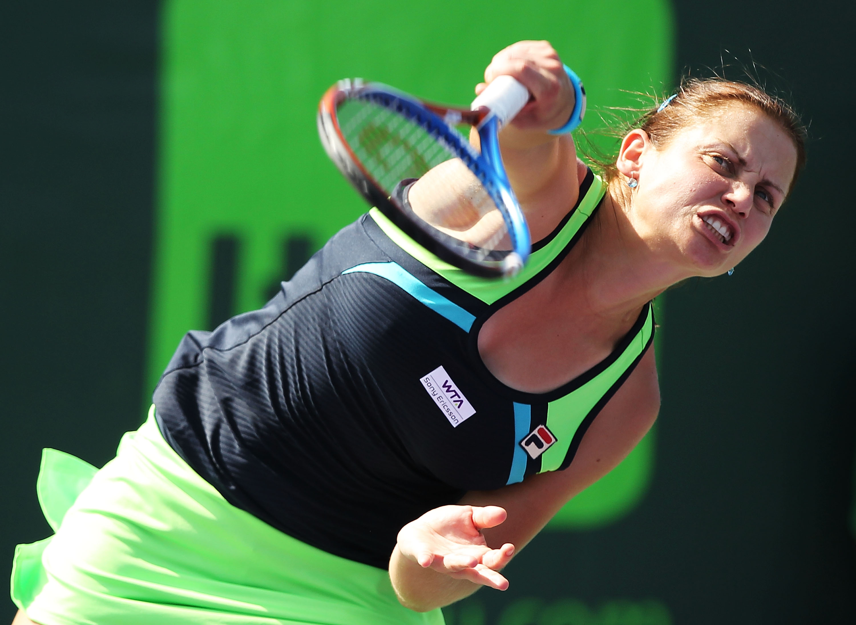 KEY BISCAYNE, FL - MARCH 22:  Jelena Dokic of Australia hits the ball against Christina McHale of the USA during the Sony Ericsson Open at Crandon Park Tennis Center on March 22, 2011 in Key Biscayne, Florida.  (Photo by Al Bello/Getty Images)
