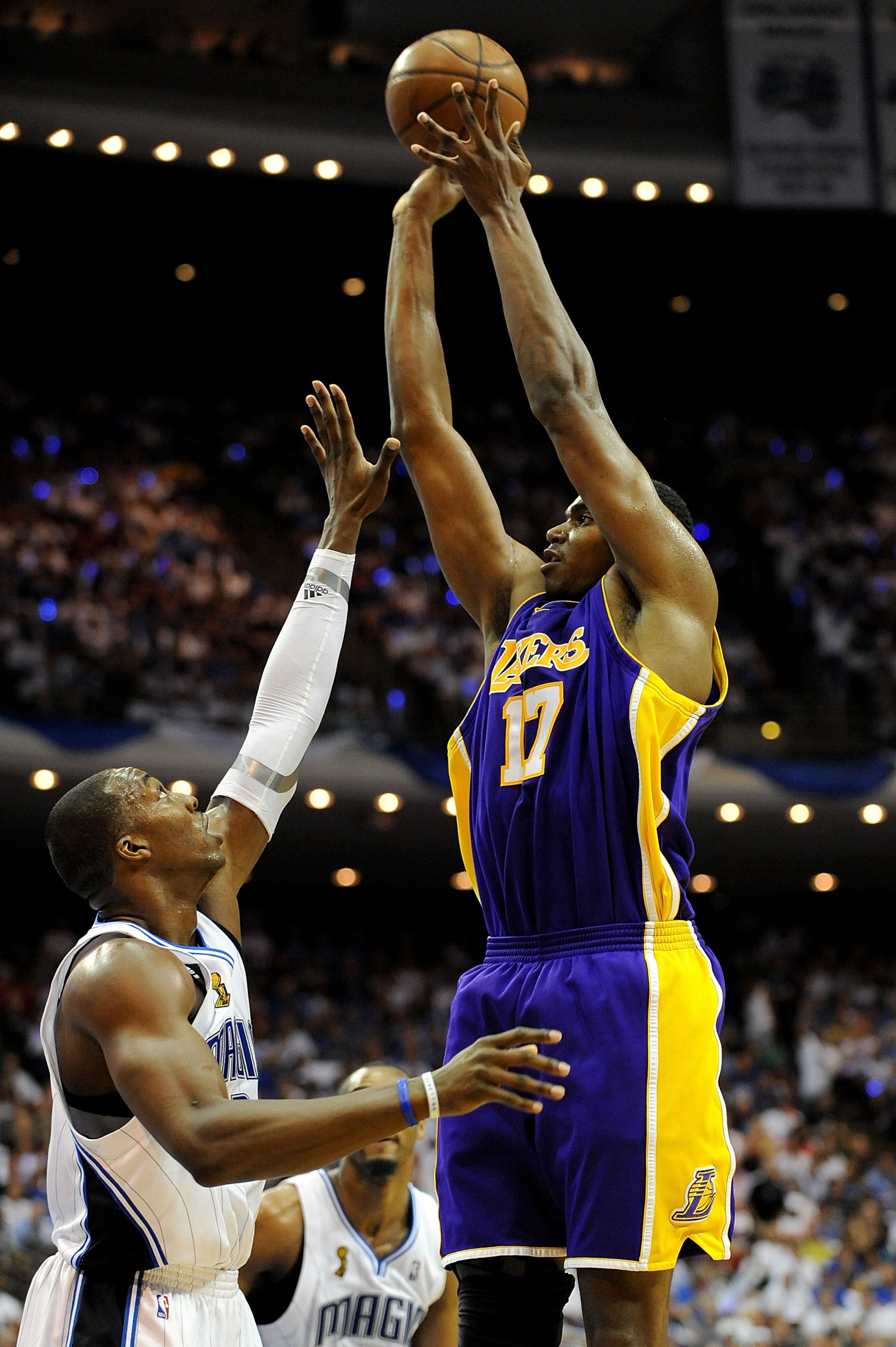 ORLANDO, FL - JUNE 09: Andrew Bynum #17 of the Los Angeles Lakers goes up for a shot over Dwight Howard #12 of the Orlando Magic in Game Three of the 2009 NBA Finals on June 9, 2009 at Amway Arena in Orlando, Florida.  NOTE TO USER:  User expressly acknow