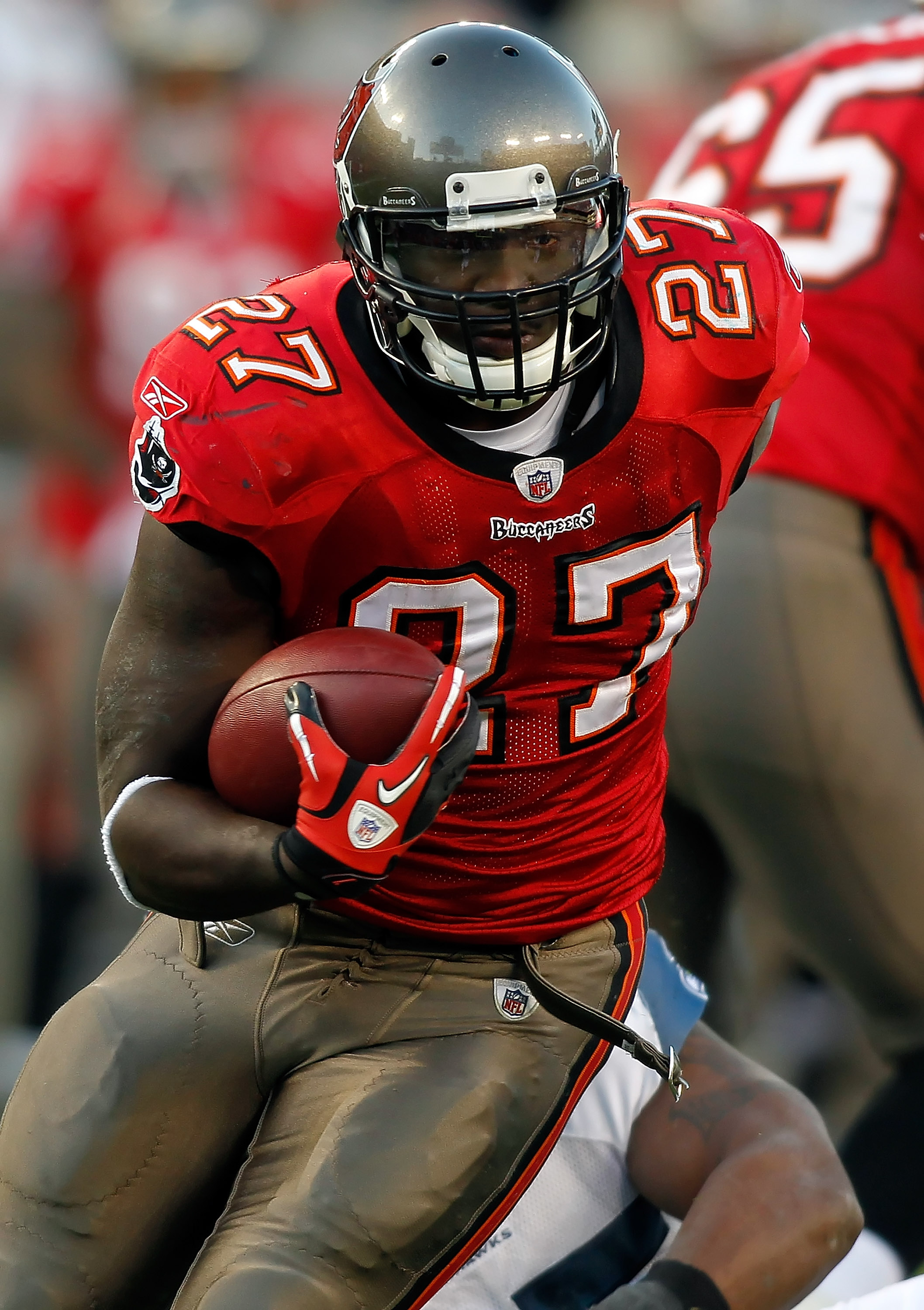 Dec 12, 2010: Tampa Bay Buccaneers running back LeGarrette Blount (27) runs  the ball during game action between the New Orleans Saints and the Tampa  Bay Buccaneers at the Louisiana Superdome in