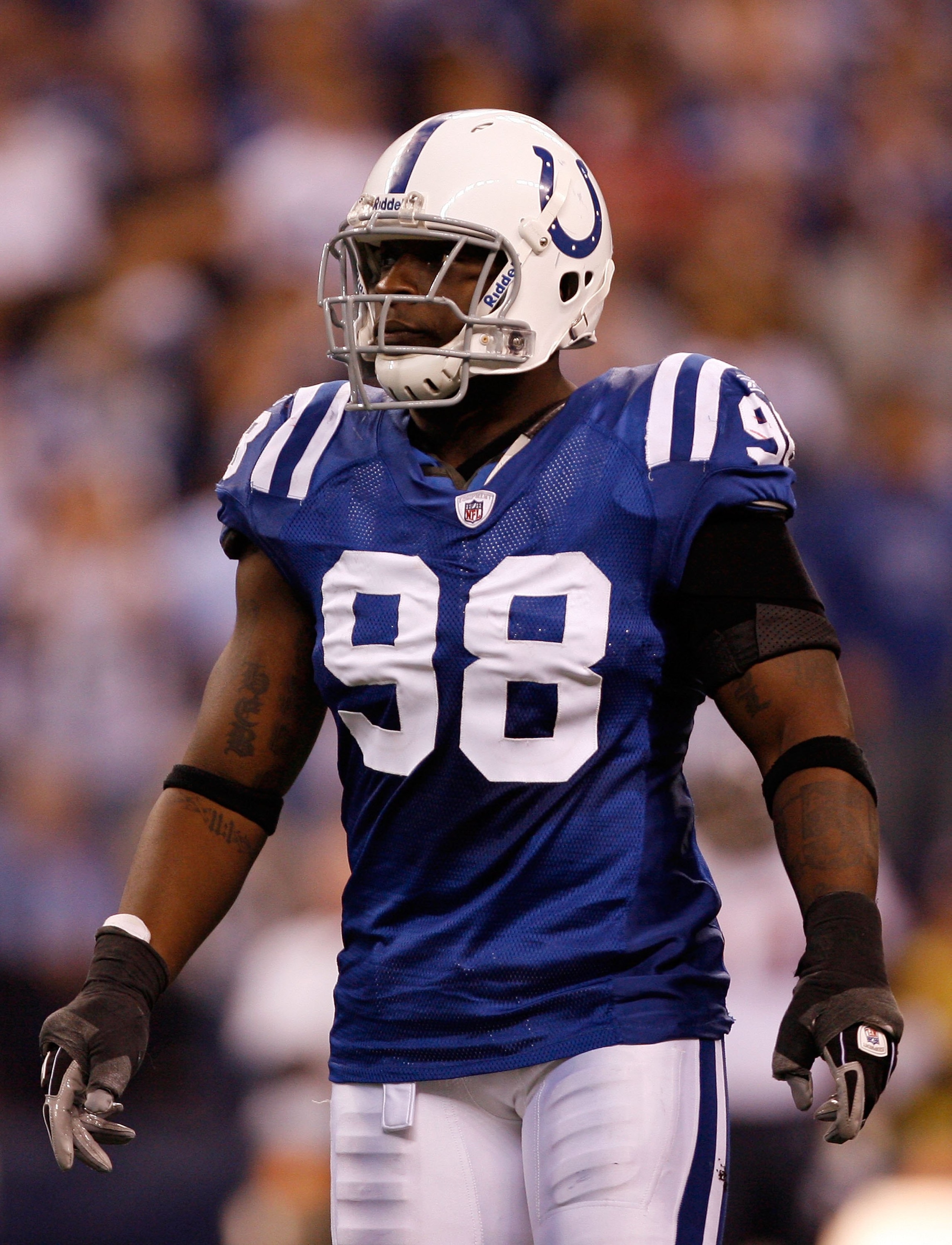 INDIANAPOLIS - NOVEMBER 16:  Robert Mathis #98 of the Indianapolis Colts waits for play against the Houston Texans during the game at Lucas Oil Stadium on November 17, 2008 in Indianapolis, Indiana.  (Photo by Harry How/Getty Images)
