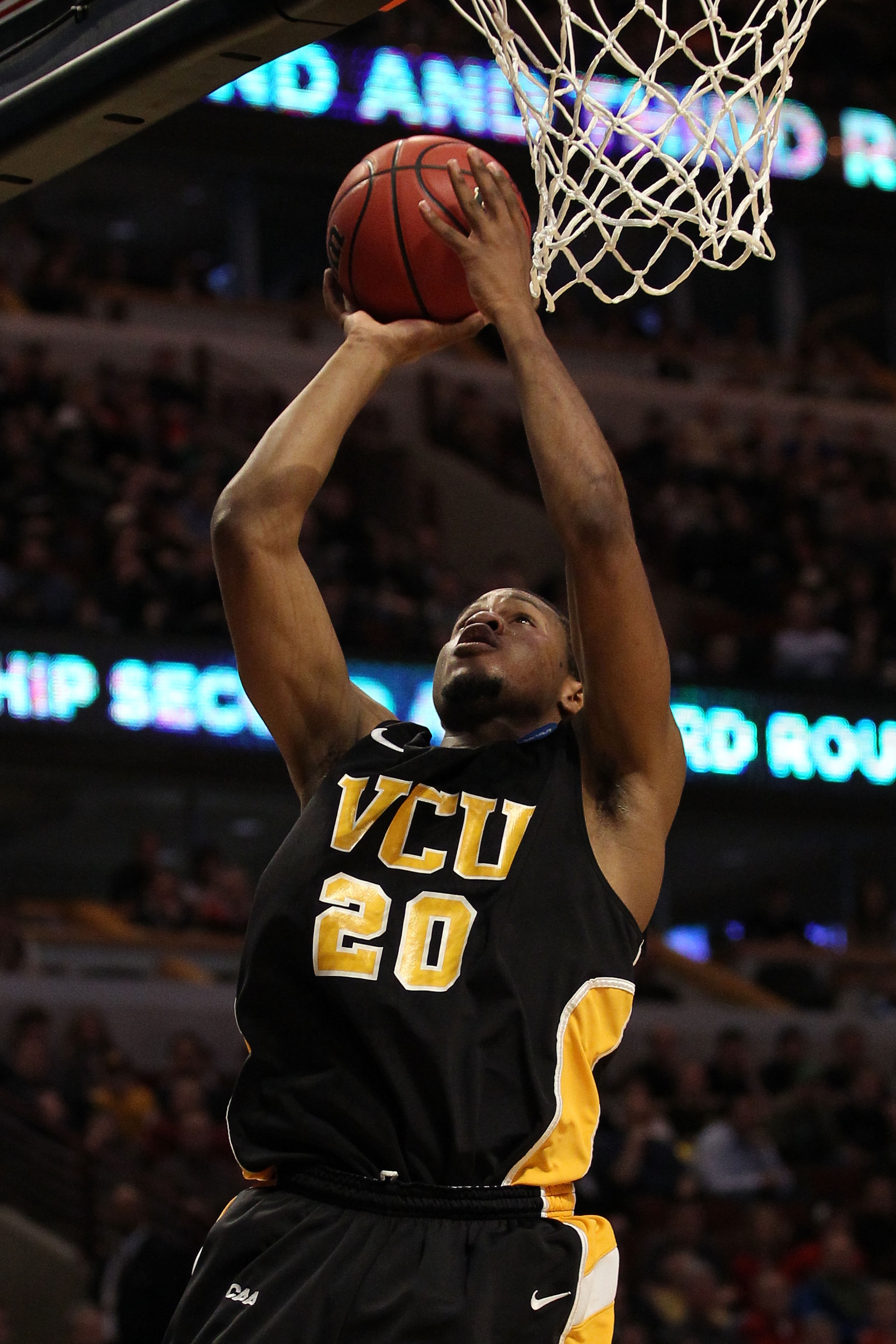 CHICAGO, IL - MARCH 20: Bradford Burgess #20 of the Virginia Commonwealth Rams shoots against the Virginia Commonwealth Rams  in the second half during the third round of the 2011 NCAA men's basketball tournament at the United Center on March 20, 2011 in