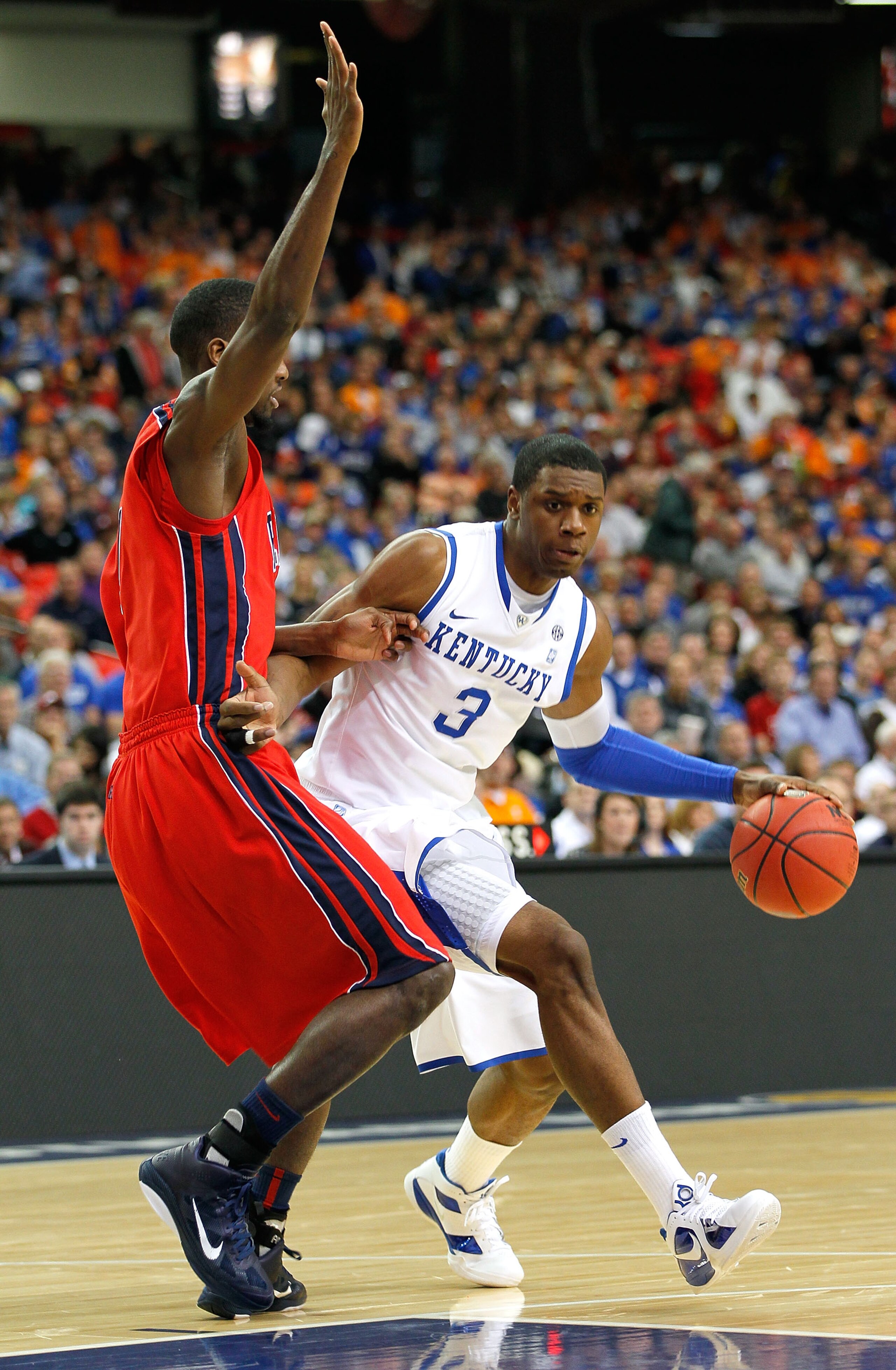 ATLANTA, GA - MARCH 11: Terrence Jones #3 of the Kentucky Wildcats drives against Terrance Henry #1 of the Ole Miss Rebels during the quarterfinals of the SEC Men's Basketball Tournament at Georgia Dome on March 11, 2011 in Atlanta, Georgia. (Photo by K ATLANTA, GA - MARCH 11: Terrence Jones #3 of the Kentucky Wildcats drives against Terrance Henry #1 of the Ole Miss Rebels during the quarterfinals of the SEC Men's Basketball Tournament at Georgia Dome on March 11, 2011 in Atlanta, Georgia. (Photo by K