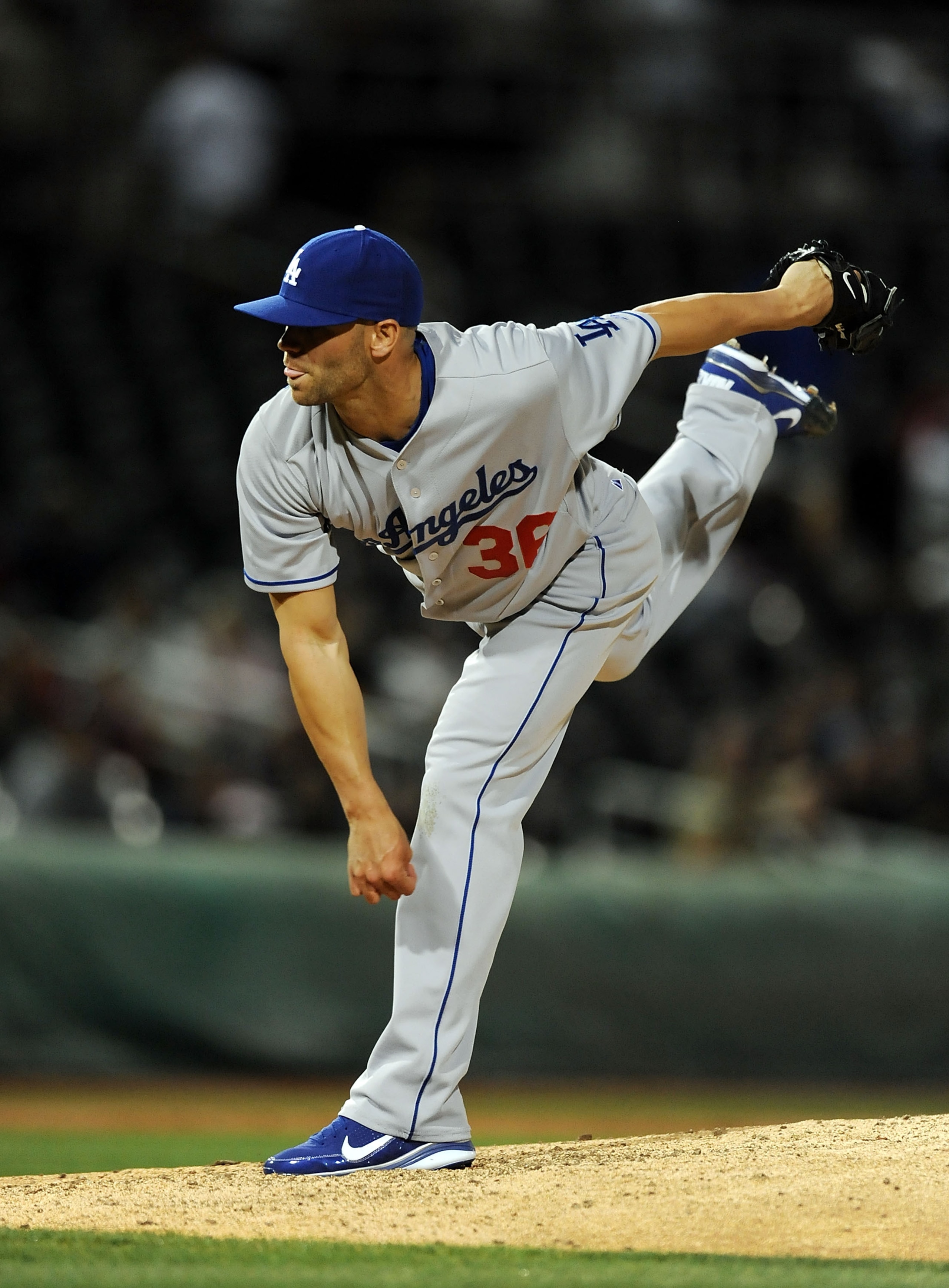 GOODYEAR, AZ - MARCH 03:  Blake Hawksworth #36 of the Los Angeles Dodgers follows through on a pitch against the Cincinnati Reds at Goodyear Ballpark on March 3, 2011 in Goodyear, Arizona.  (Photo by Norm Hall/Getty Images)