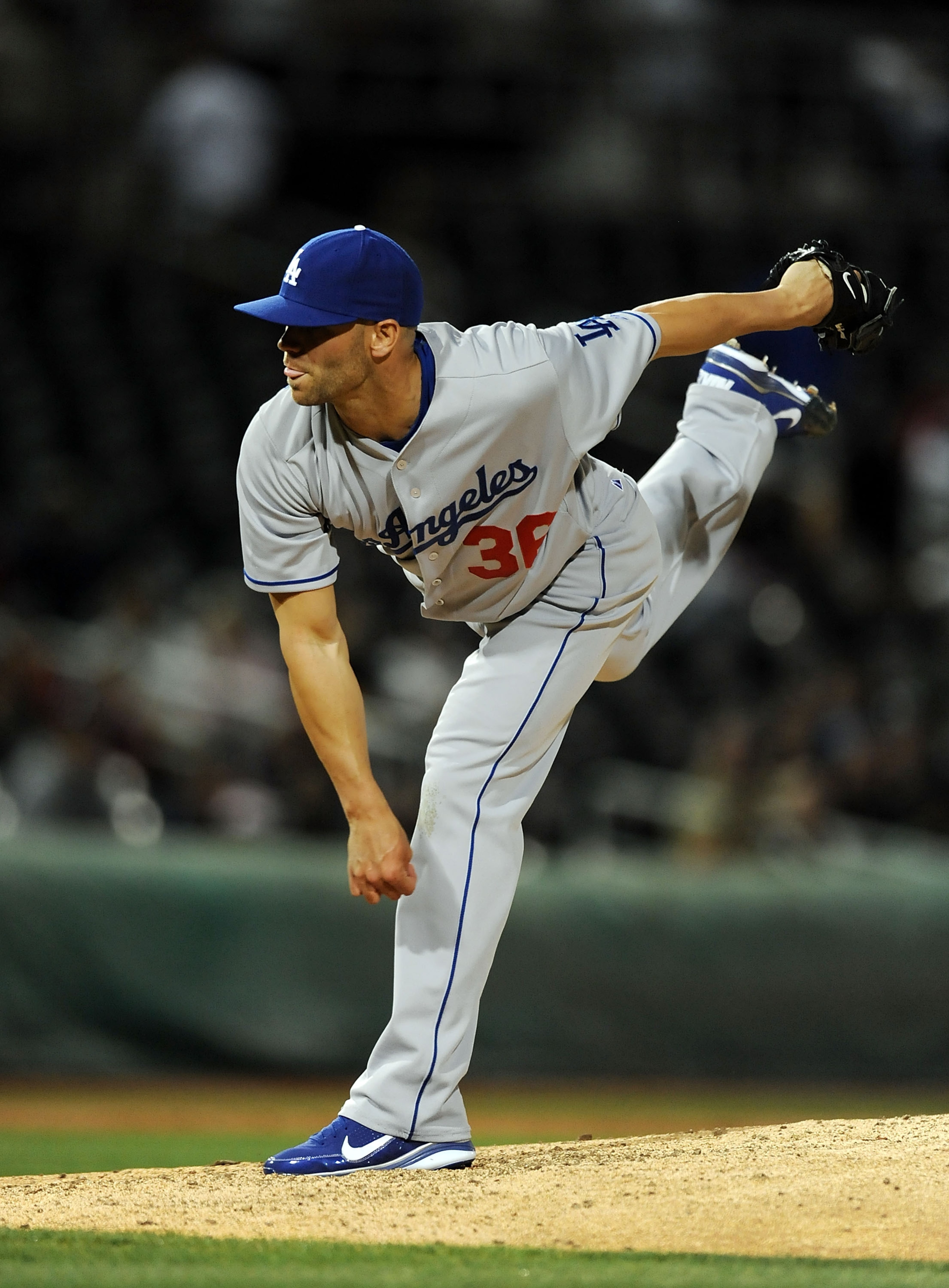 GOODYEAR, AZ - MARCH 03:  Blake Hawksworth #36 of the Los Angeles Dodgers follows through on a pitch against the Cincinnati Reds at Goodyear Ballpark on March 3, 2011 in Goodyear, Arizona.  (Photo by Norm Hall/Getty Images)