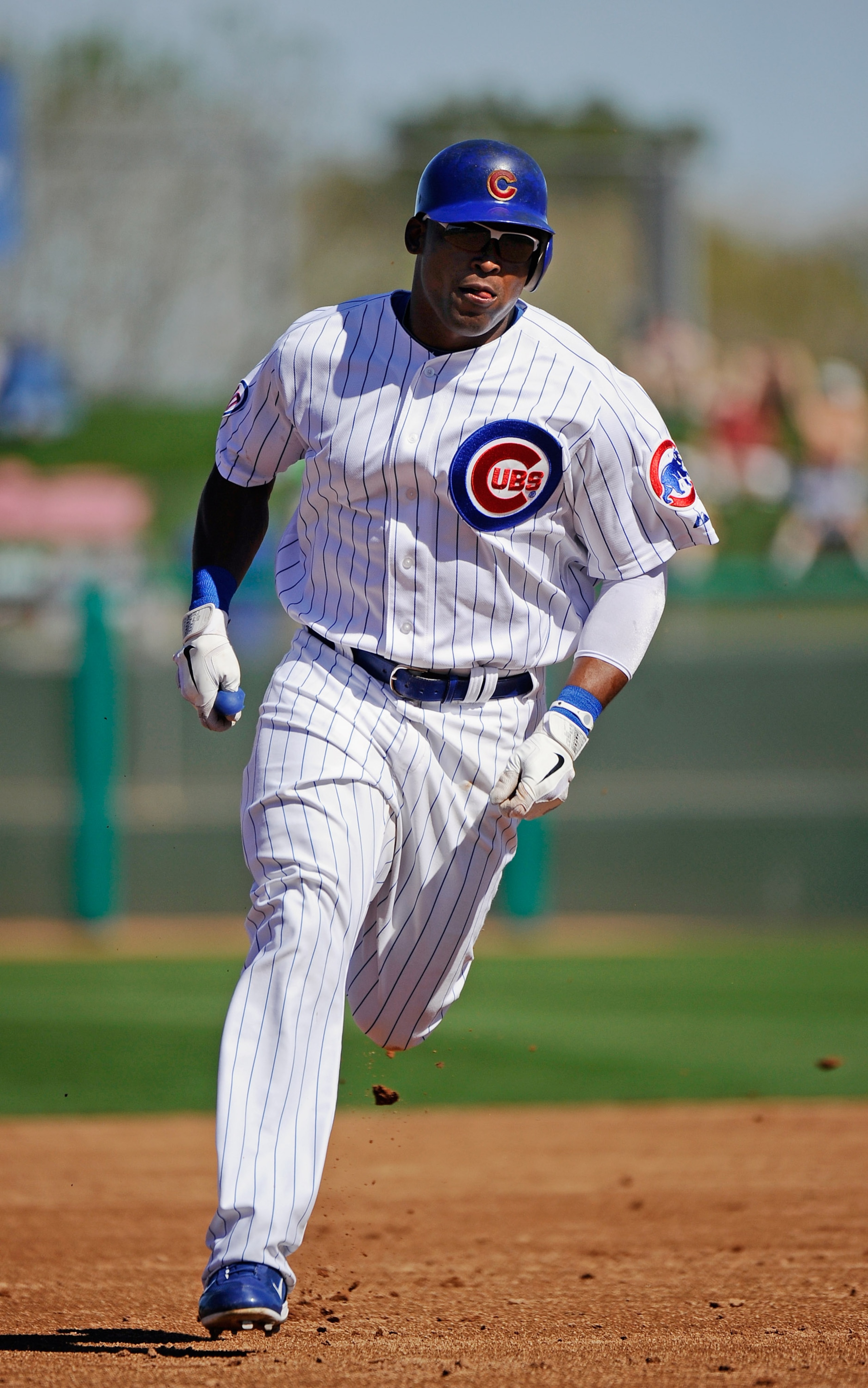 MESA, AZ - MARCH 09:  Marlon Byrd #24 of the Chicago Cubs runs the bases after hitting a solo home run against the Kansas City Royals in the third inning against during the spring training baseball game at HoHoKam Stadium on March 9, 2011 in Mesa, Arizona