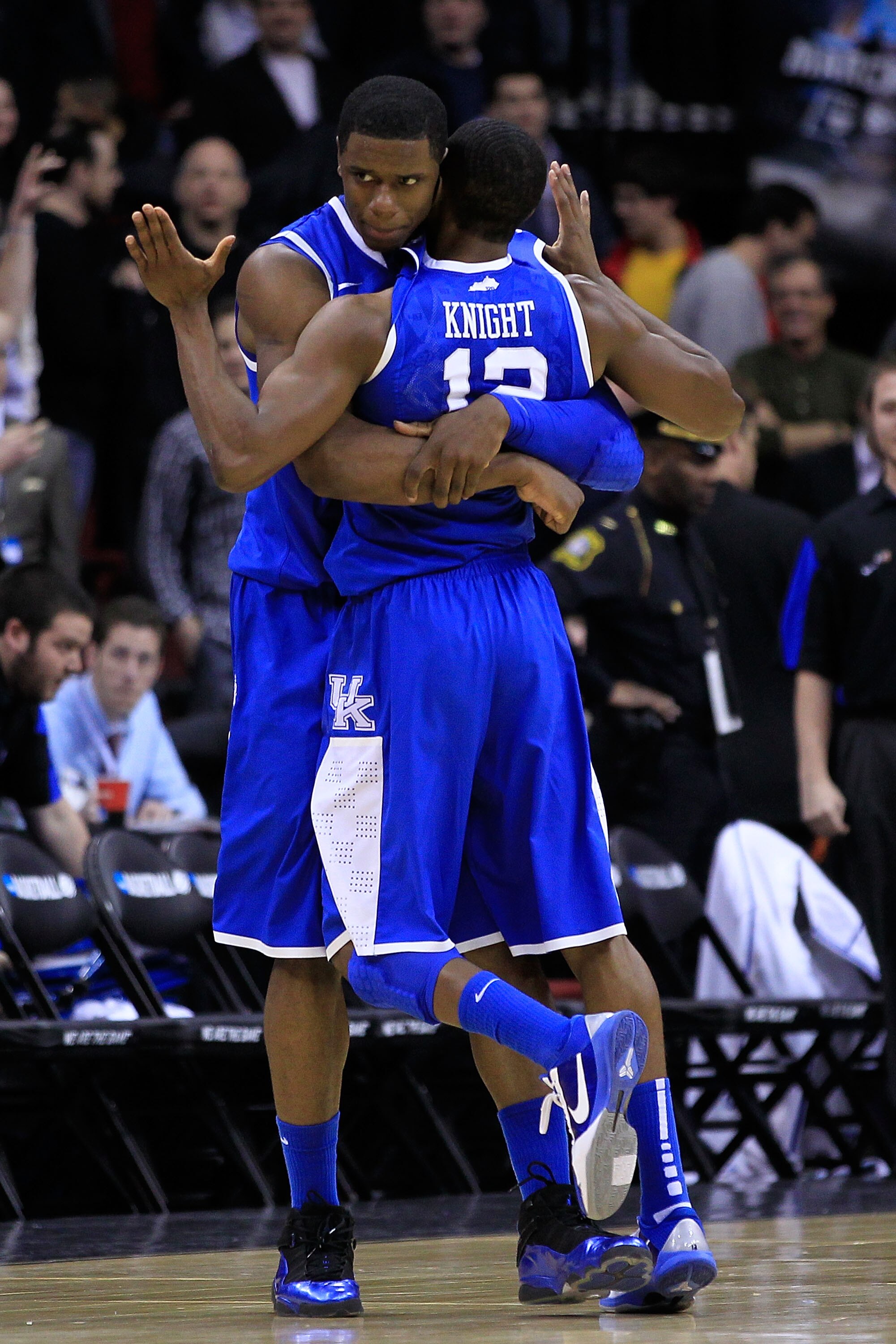 NEWARK, NJ - MARCH 25:  Terrence Jones #3 hugs teammates Brandon Knight #12 of the Kentucky Wildcats after defeating the Ohio State Buckeyes in the east regional semifinal of the 2011 NCAA Men's Basketball Tournament at the Prudential Center on March 25,