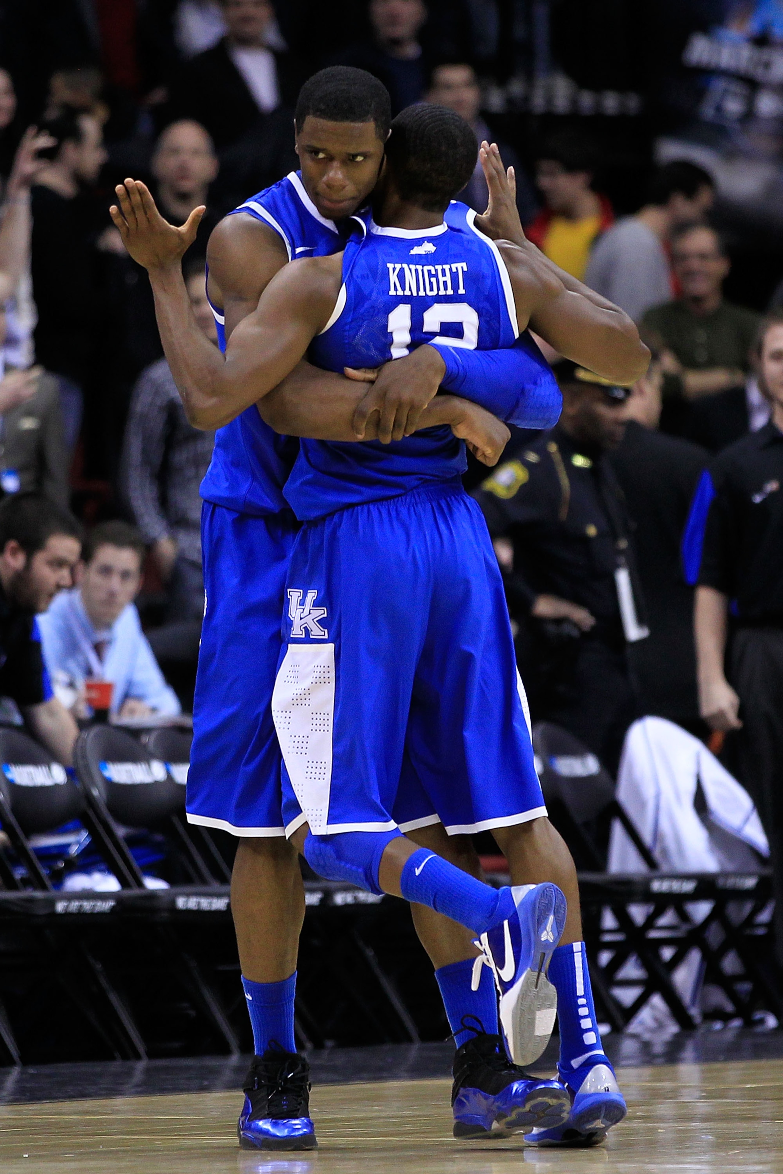NEWARK, NJ - MARCH 25: Terrence Jones #3 hugs teammates Brandon Knight #12 of the Kentucky Wildcats after defeating the Ohio State Buckeyes in the east regional semifinal of the 2011 NCAA Men's Basketball Tournament at the Prudential Center on March 25, NEWARK, NJ - MARCH 25: Terrence Jones #3 hugs teammates Brandon Knight #12 of the Kentucky Wildcats after defeating the Ohio State Buckeyes in the east regional semifinal of the 2011 NCAA Men's Basketball Tournament at the Prudential Center on March 25,