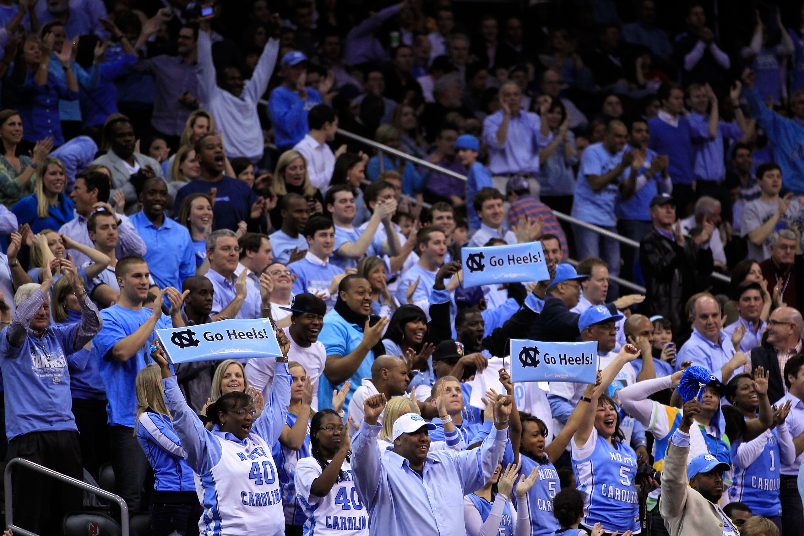 NEWARK, NJ - MARCH 25: Fans of the North Carolina Tar Heels cheer during the east regional semifinal of the 2011 NCAA Men's Basketball Tournament at the Prudential Center on March 25, 2011 in Newark, New Jersey. (Photo by Chris Trotman/Getty Images) NEWARK, NJ - MARCH 25: Fans of the North Carolina Tar Heels cheer during the east regional semifinal of the 2011 NCAA Men's Basketball Tournament at the Prudential Center on March 25, 2011 in Newark, New Jersey. (Photo by Chris Trotman/Getty Images)