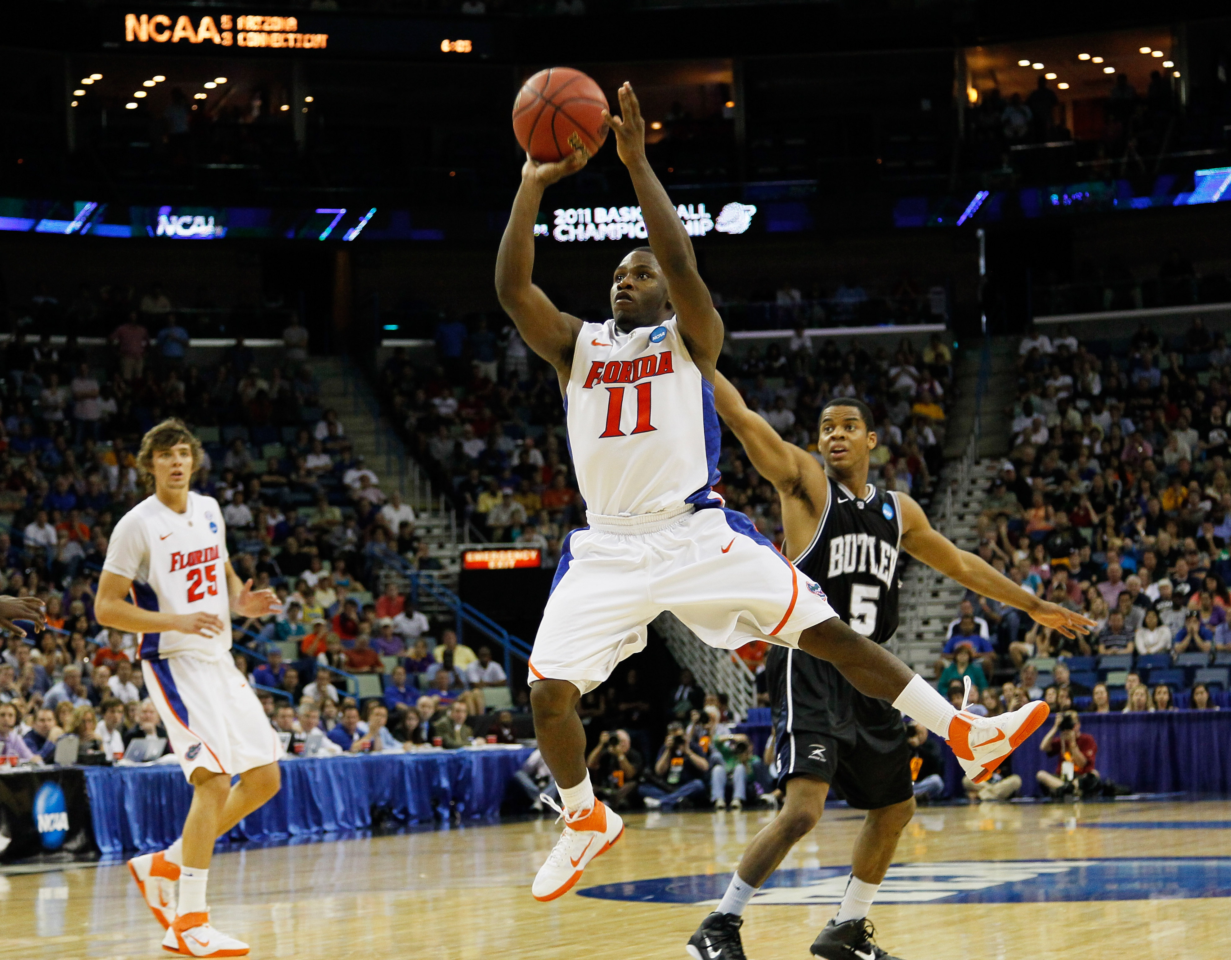 NEW ORLEANS, LA - MARCH 26:  Erving Walker #11 of the Florida Gators shoots against the Butler Bulldogs during the Southeast regional final of the 2011 NCAA men's basketball tournament at New Orleans Arena on March 26, 2011 in New Orleans, Louisiana.  (Ph