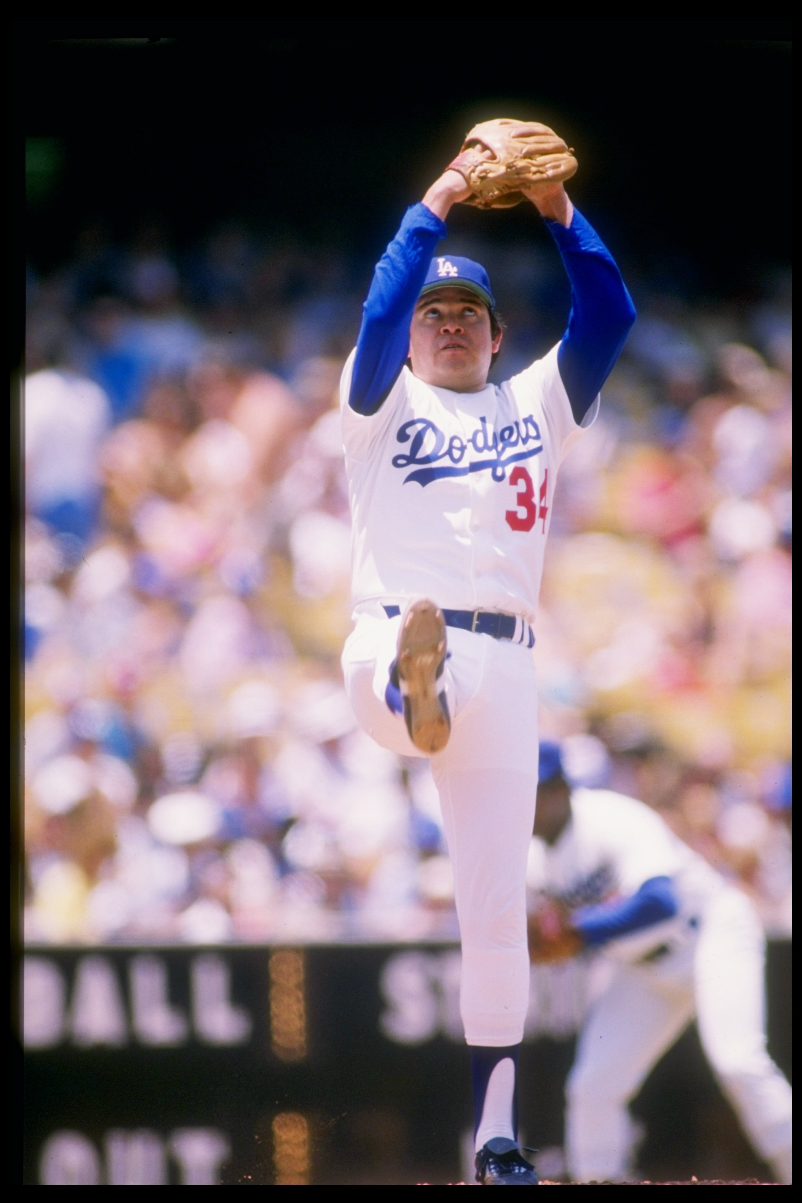1988:  Pitcher Fernando Valenzuela of the Los Angeles Dodgers prepares to throw the ball during a game against the Houston Astros at Dodger Stadium in Los Angeles, California. Mandatory Credit: Mike Powell  /Allsport