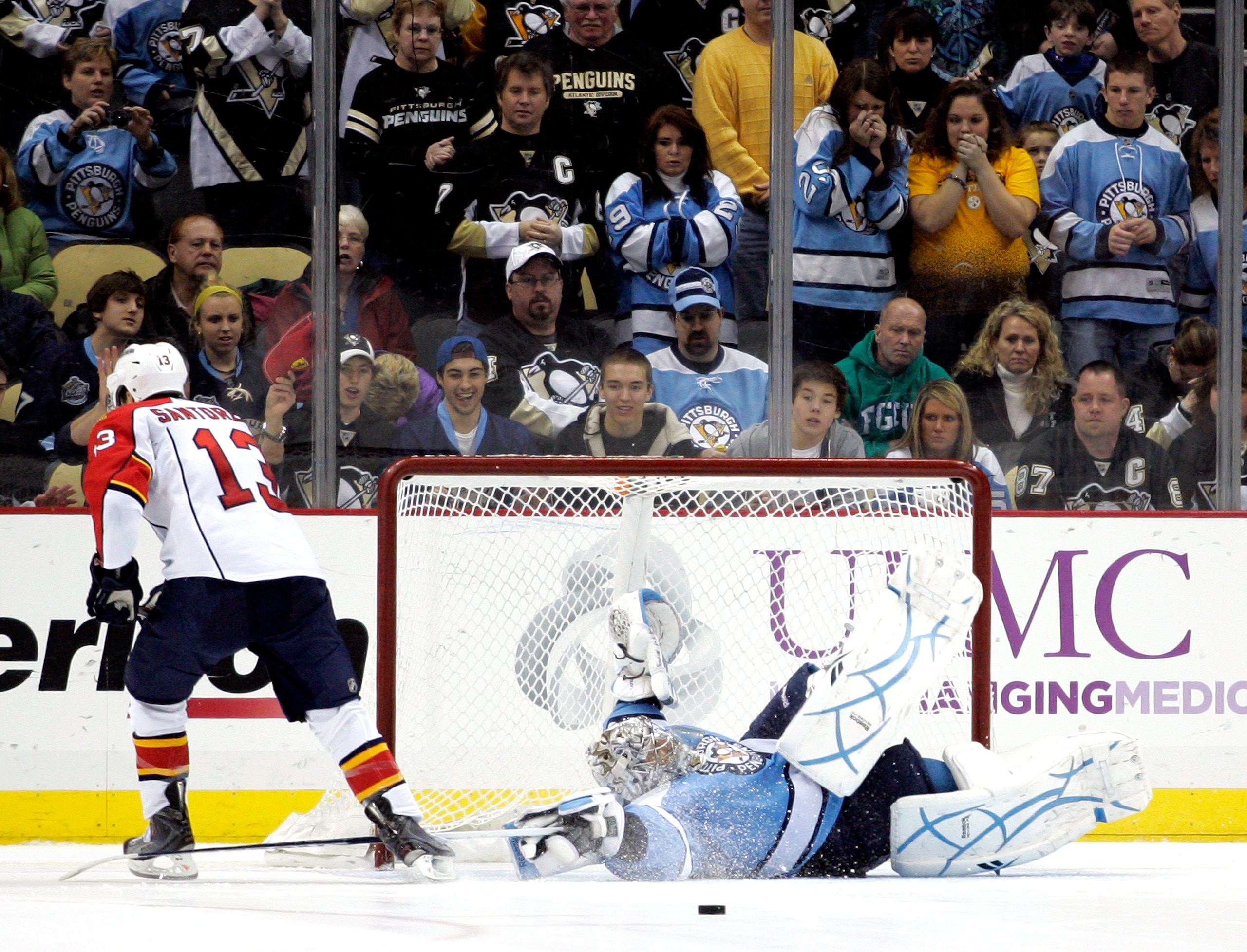 PITTSBURGH, PA - MARCH 27: Marc-Andre Fleury #29 of the Pittsburgh Penguins makes a save against Mike Santorelli #13 of the Florida Panthers during the shootout at Consol Energy Center on March 27, 2011 in Pittsburgh, Pennsylvania. The Penguins defeated t PITTSBURGH, PA - MARCH 27: Marc-Andre Fleury #29 of the Pittsburgh Penguins makes a save against Mike Santorelli #13 of the Florida Panthers during the shootout at Consol Energy Center on March 27, 2011 in Pittsburgh, Pennsylvania. The Penguins defeated t