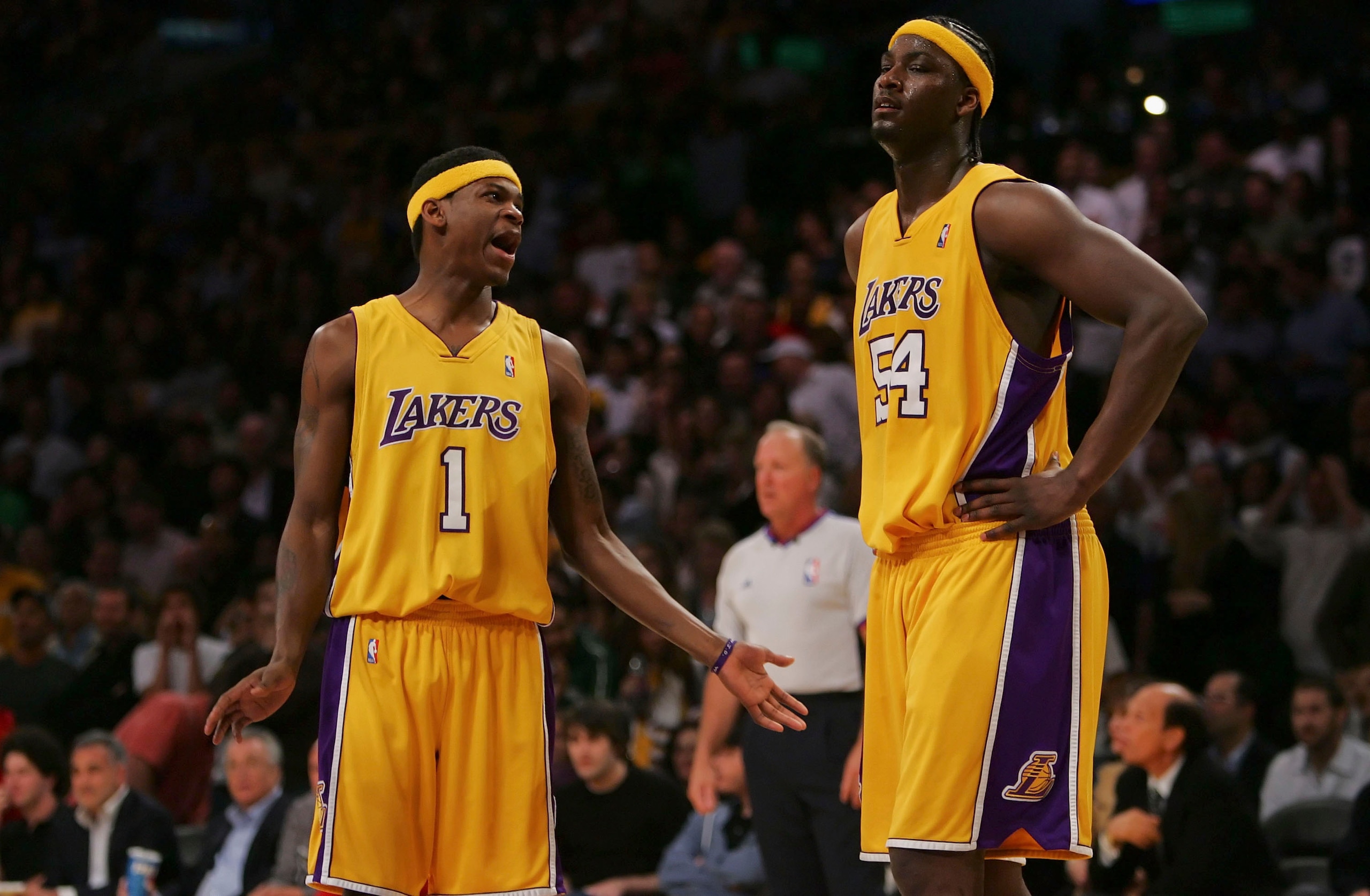 LOS ANGELES, CA - MARCH 30:  (L-R) Smush Parker #1 of the Los Angeles Lakers talks with his teammate Kwame Brown #54 during the game against the Houston Rockets at Staples Center on March 30, 2007 in Los Angeles, California.  NOTE TO USER: User expressly