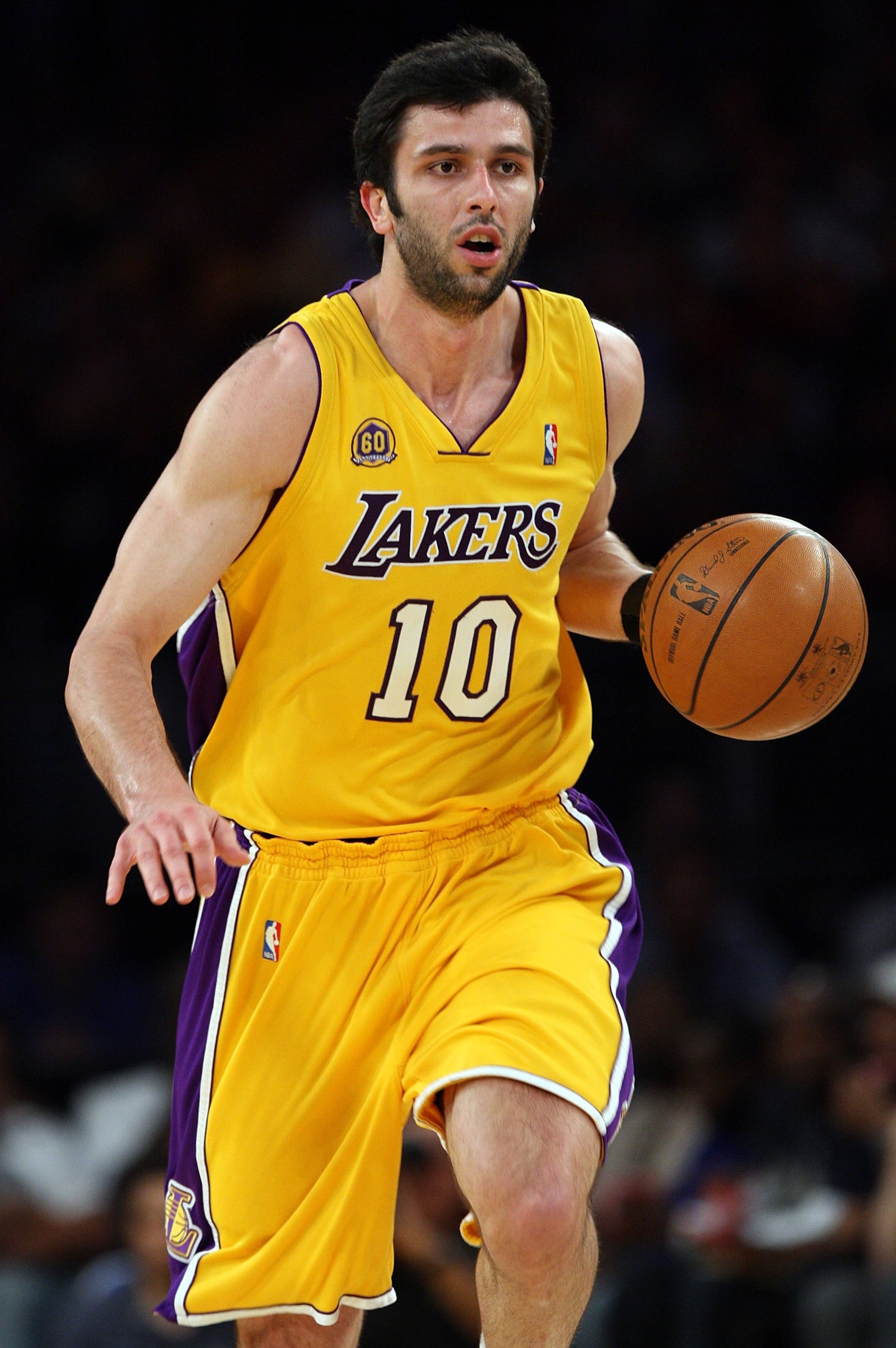 LOS ANGELES, CA - MAY 14:  Vladimir Radmanovic #10 of the Los Angeles Lakers moves the ball upcourt while taking on the Utah Jazz in Game Five of the Western Conference Semifinals during the 2008 NBA Playoffs at Staples Center on May 14, 2008 in Los Angel