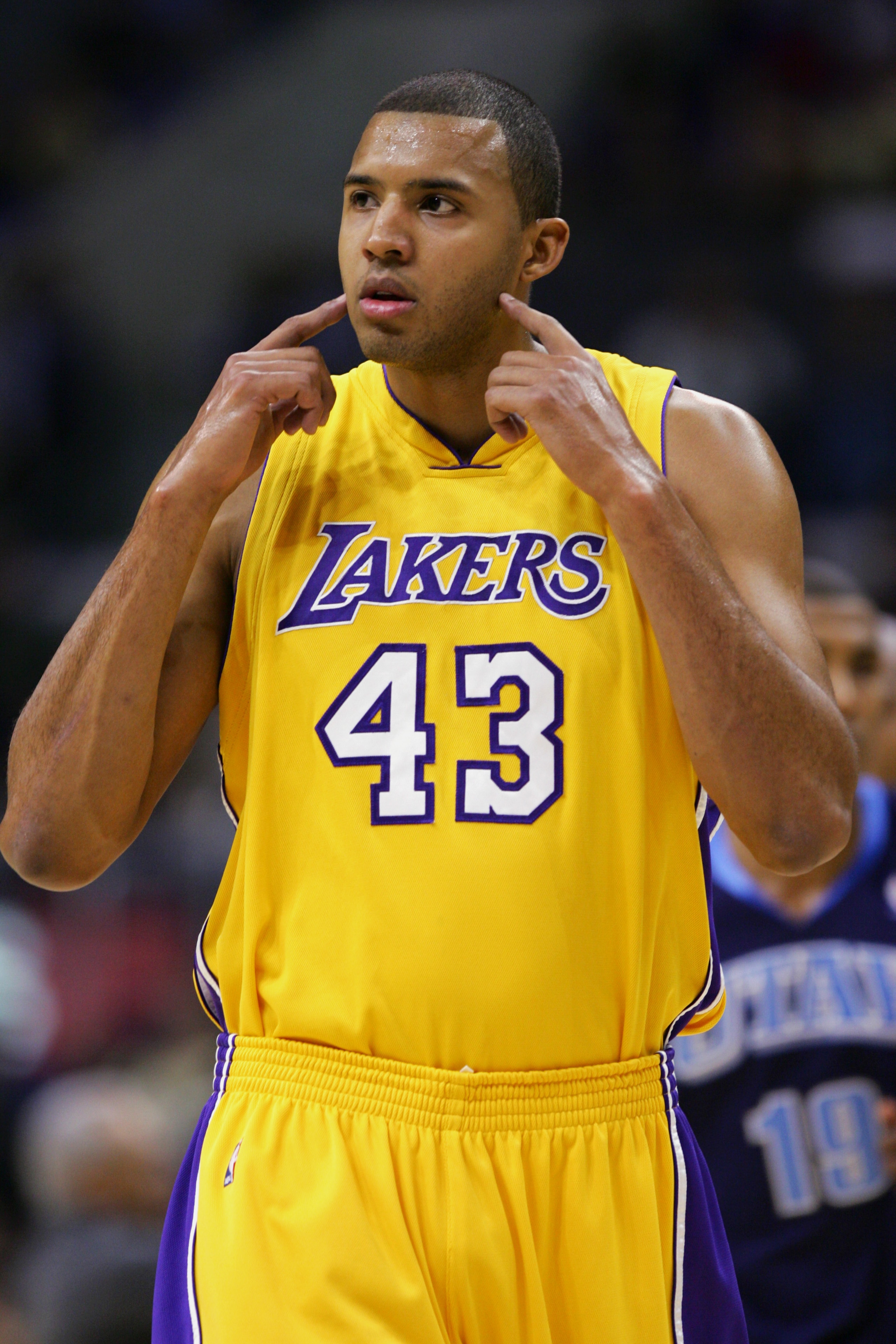 LOS ANGELES - JANUARY 17:  Brian Cook #43 of the Los Angeles Lakers reacts during the game against the Utah Jazz on January 17, 2005 at Staples Center in Los Angeles, California. The Jazz won 102-94. NOTE TO USER: User expressly acknowledges and agrees th