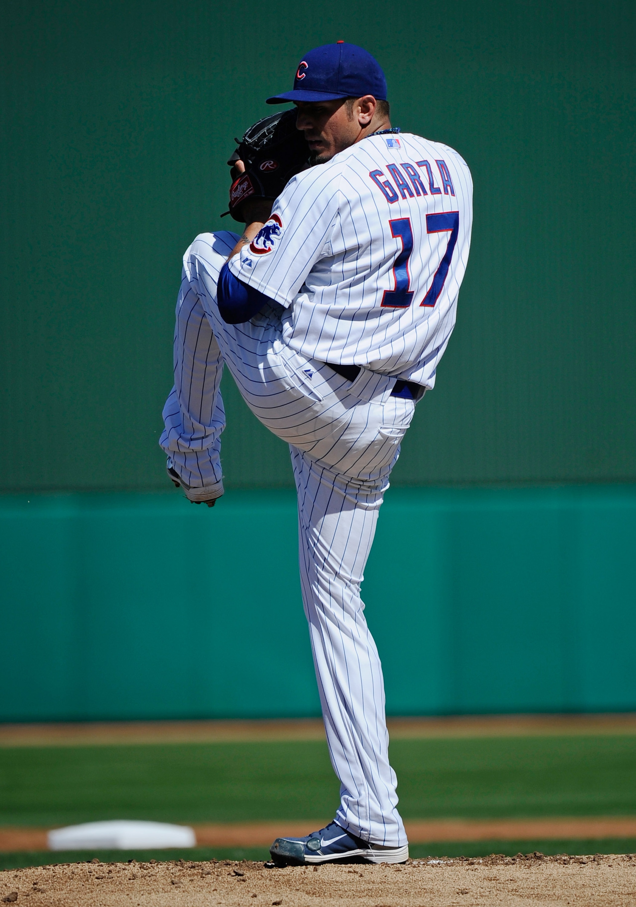 MESA, AZ - MARCH 09: Matt Garza #17 pitcher of the Chicago Cubs throws a ptich against the Kansas City Royals during the spring training baseball game at HoHoKam Stadium on March 9, 2011 in Mesa, Arizona. (Photo by Kevork Djansezian/Getty Images) MESA, AZ - MARCH 09: Matt Garza #17 pitcher of the Chicago Cubs throws a ptich against the Kansas City Royals during the spring training baseball game at HoHoKam Stadium on March 9, 2011 in Mesa, Arizona. (Photo by Kevork Djansezian/Getty Images)