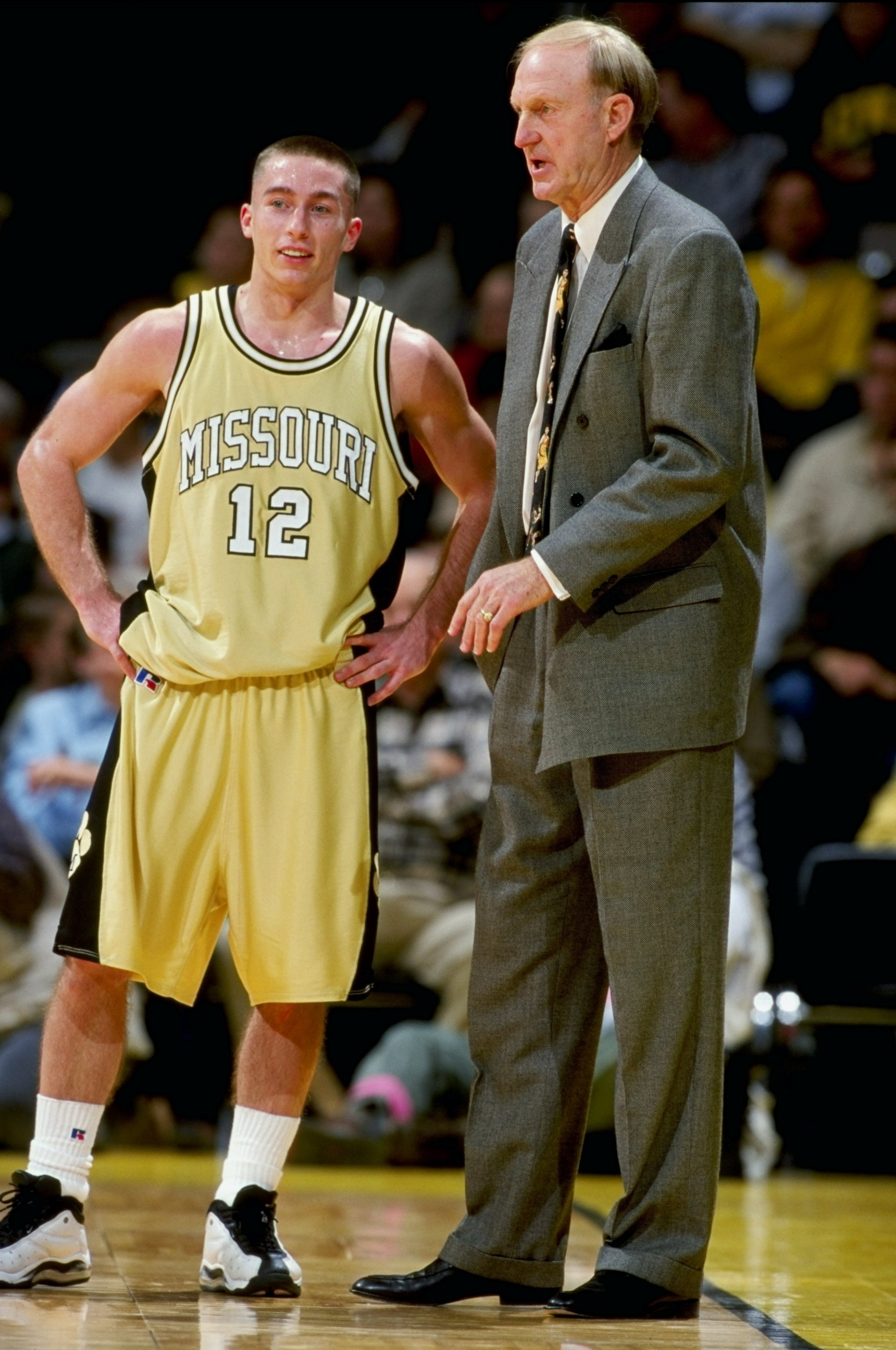 19 Dec 1998: Brian Grawer #12 of the Missouri Tigers talks to head coach Norm Stewart during the game against the Iowa Hawkeyes at the Carver-Hawkeye Arena in Iowa City, Iowa. The Hawkeyes defeated the Tigers 82-68.