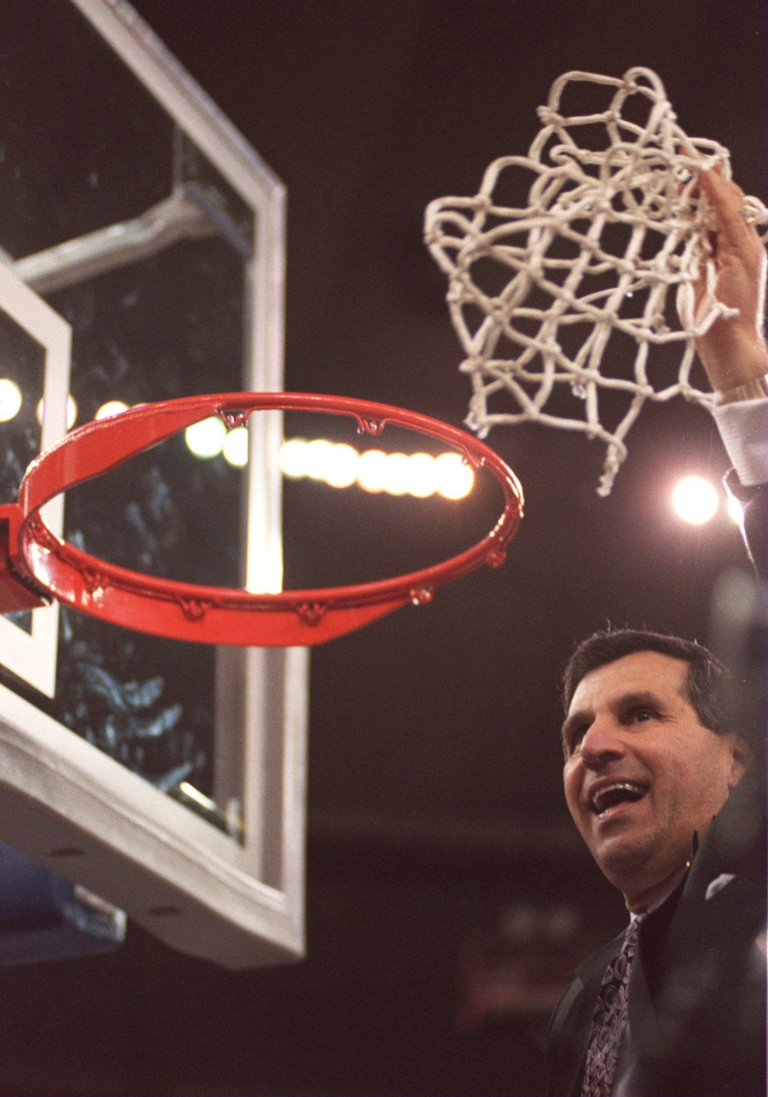 3 APR 1995:  UCLA  COACH JIM HARRICK CELEBRATES AFTER DEFEATING ARKANSAS 89-78 IN THE NCAA MEN''S BASKETBALL CHAMPIONSHIP TONIGHT AT THE KINGDOME IN SEATTLE, WASHINGTON.    Mandatory Credit: Stephen Dunn/ALLSPORT