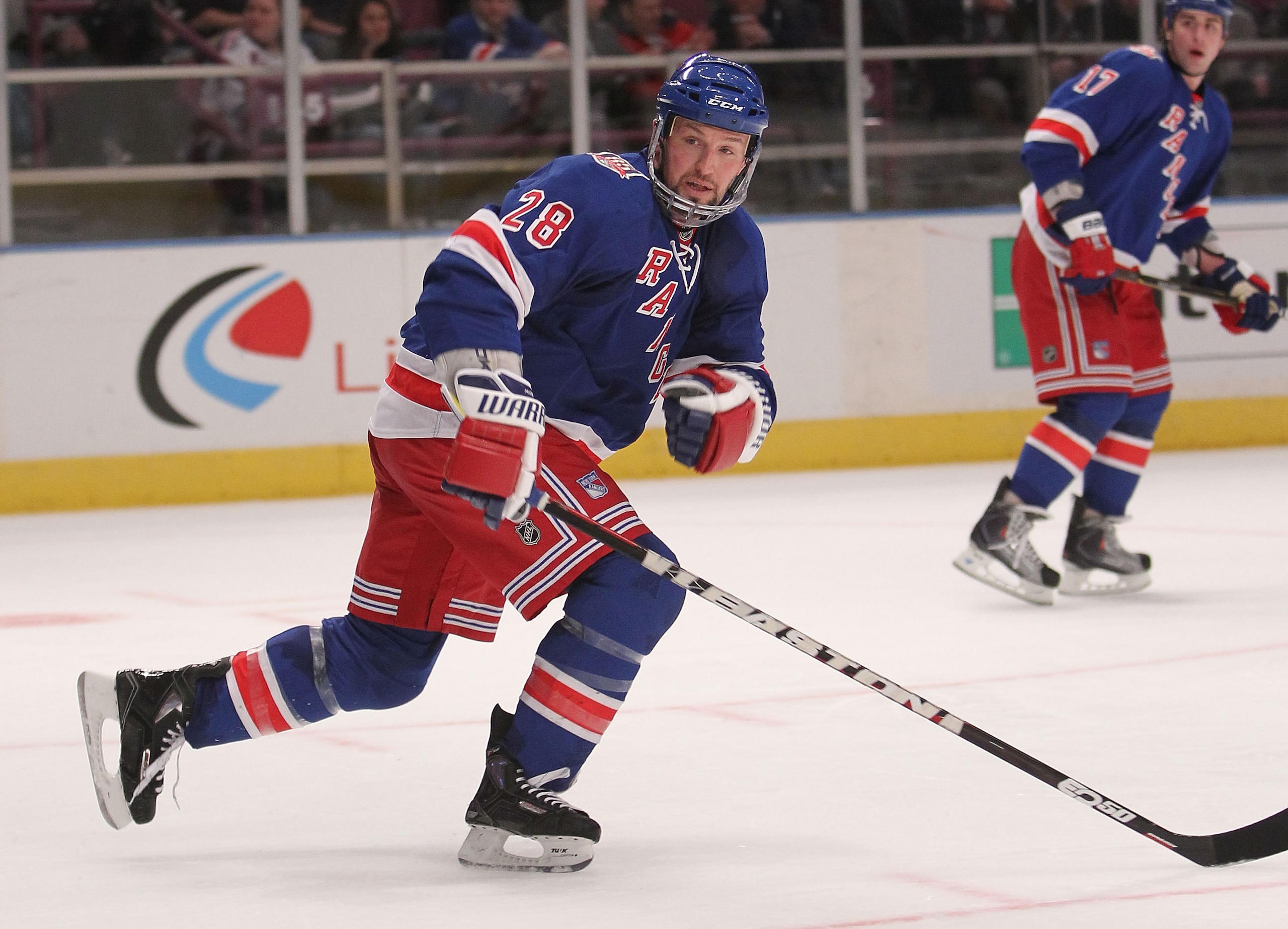NEW YORK, NY - MARCH 01:  Bryan McCabe #28 of the New York Rangers skates with the puck against the Buffalo Sabres at Madison Square Garden on March 1, 2011 in New York City.  (Photo by Nick Laham/Getty Images)