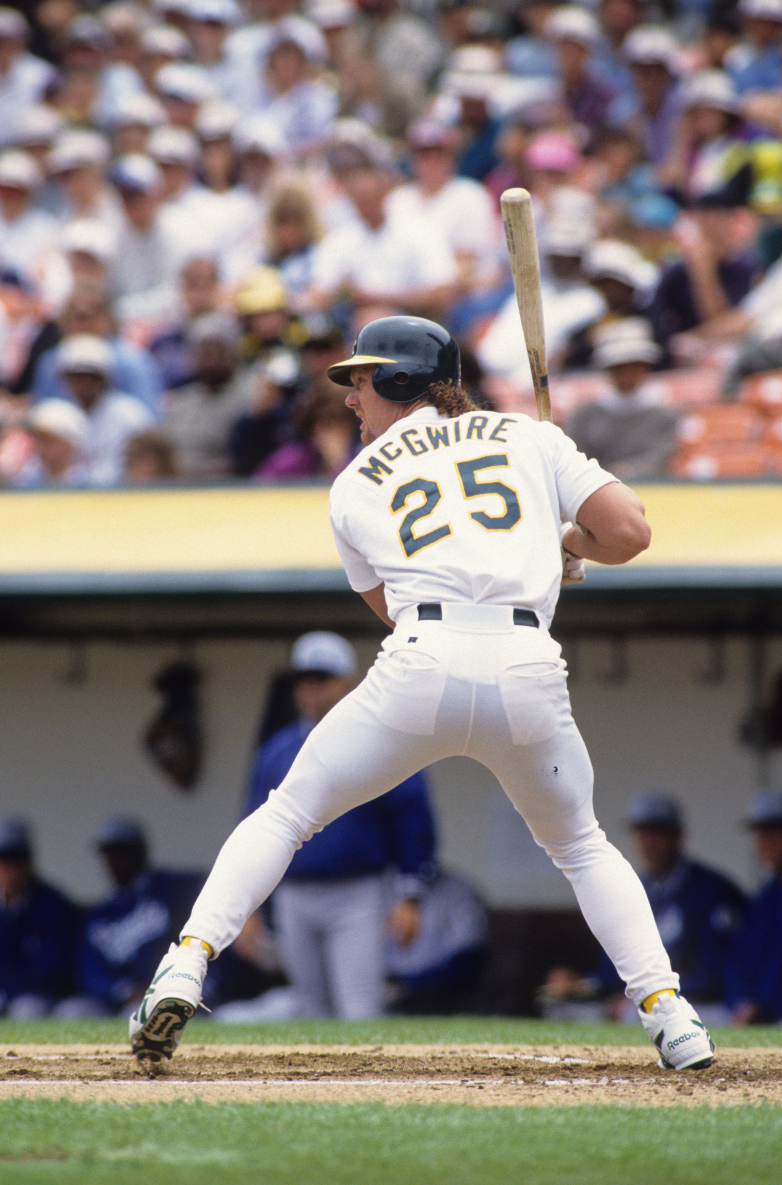 OAKLAND, CA - JUNE 18:  Mark McGwire #25 of the Oakland Athletics bats during the game against the Kansas City Royals at Oakland-Alameda County Coliseum on June 18, 1995 in Oakland, California. (Photo by Otto Greule Jr/Getty Images)
