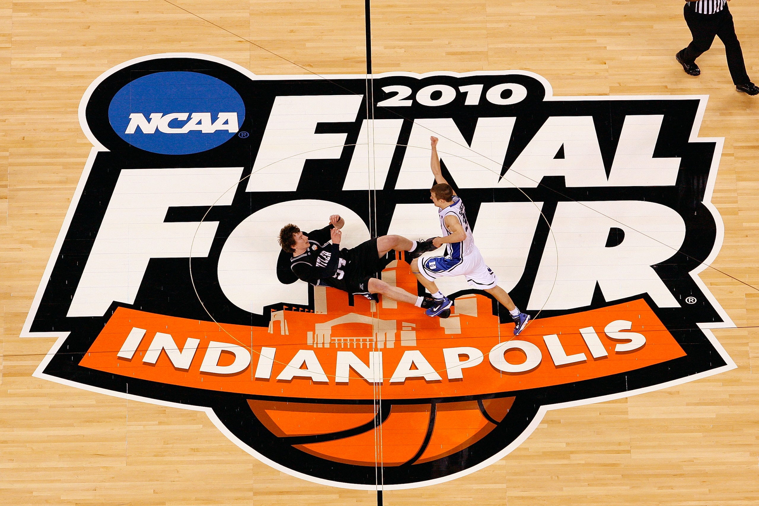 INDIANAPOLIS - APRIL 05:  Jon Scheyer #30 of the Duke Blue Devils celebrates after they won 61-59 against Matt Howard #54 (lying on the court at L) of the Butler Bulldogs during the 2010 NCAA Division I Men's Basketball National Championship game at Lucas
