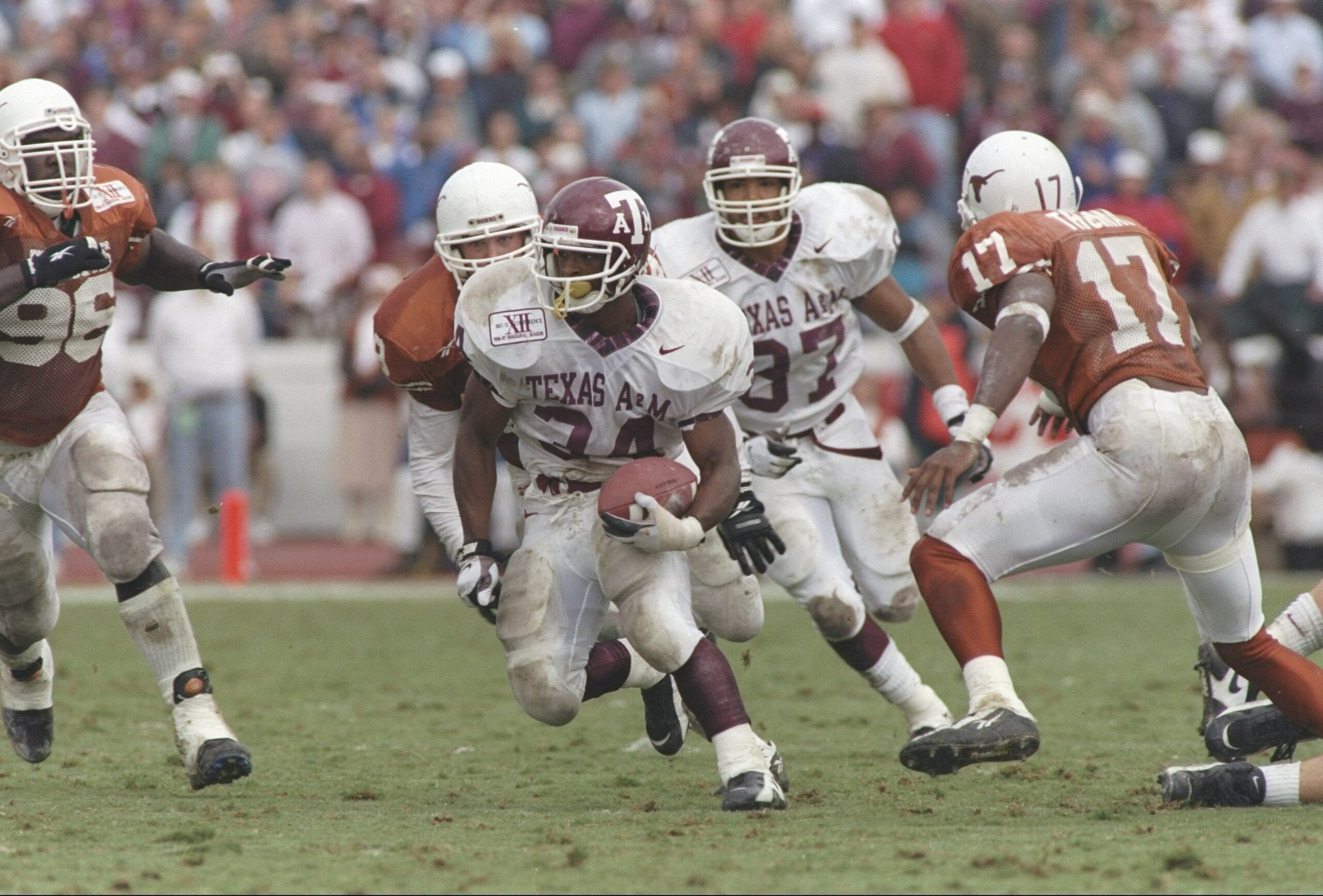 29 Nov 1996:  Running back Dante Hall of the Texas A&M Aggies runs down the field during a game against the Texas Longhorns at Texas Memorial Stadium in Austin, Texas.  Texas won the game 51-15. Mandatory Credit: Brian Bahr  /Allsport