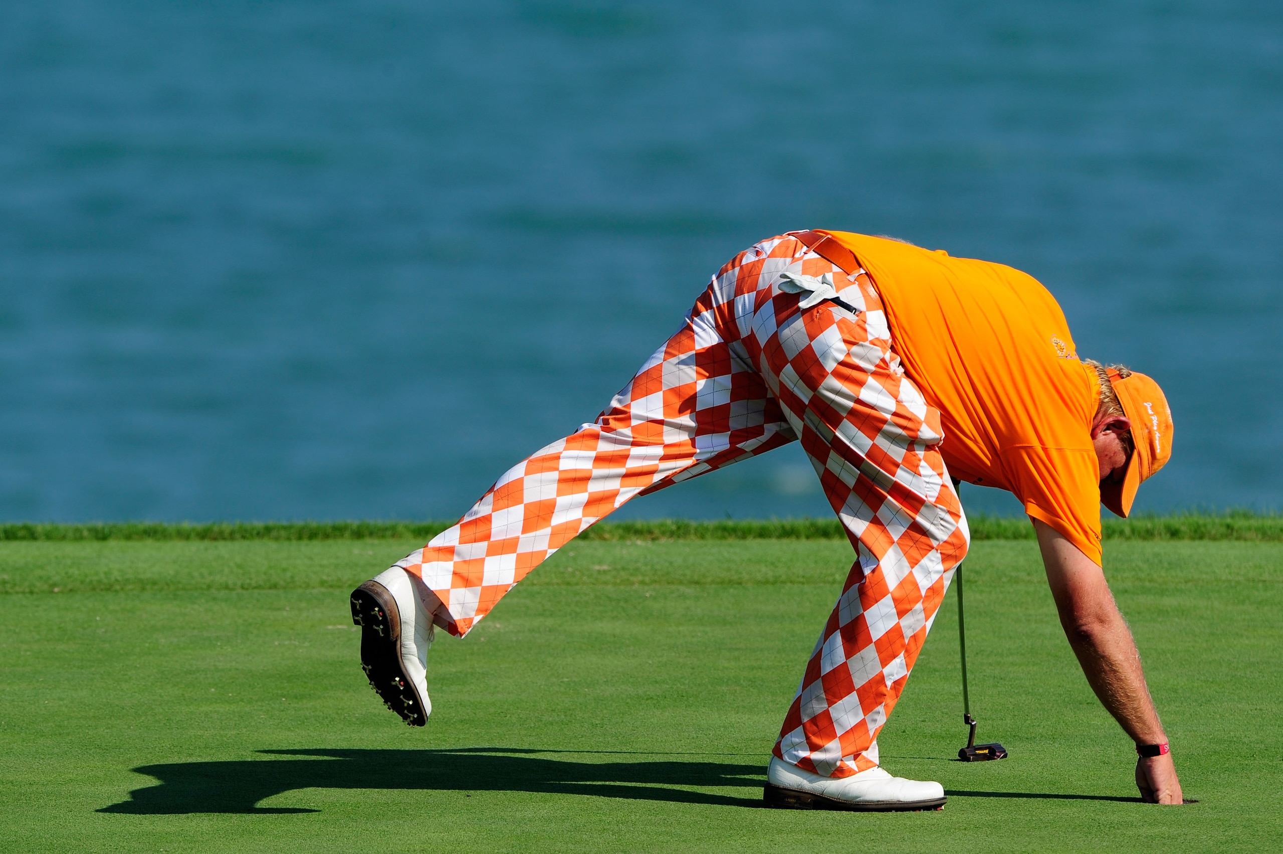 KOHLER, WI - AUGUST 12:  John Daly waits on the eighth green during the first round of the 92nd PGA Championship on the Straits Course at Whistling Straits on August 12, 2010 in Kohler, Wisconsin.  (Photo by Stuart Franklin/Getty Images)