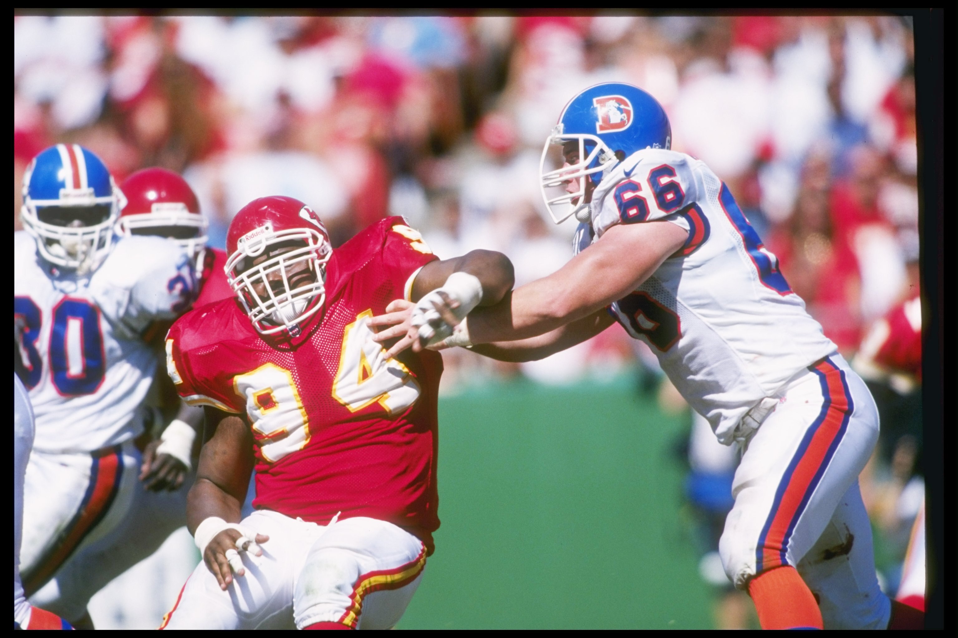 22 Sep 1996:  Offensive lineman Tom Nalen of the Denver Broncos (right) blocks Kansas City Chiefs defensive lineman Keith Traylor during a game at Arrowhead Stadium in Kansas City, Missouri.  The Chiefs won the game, 17-14. Mandatory Credit: Stephen Dunn