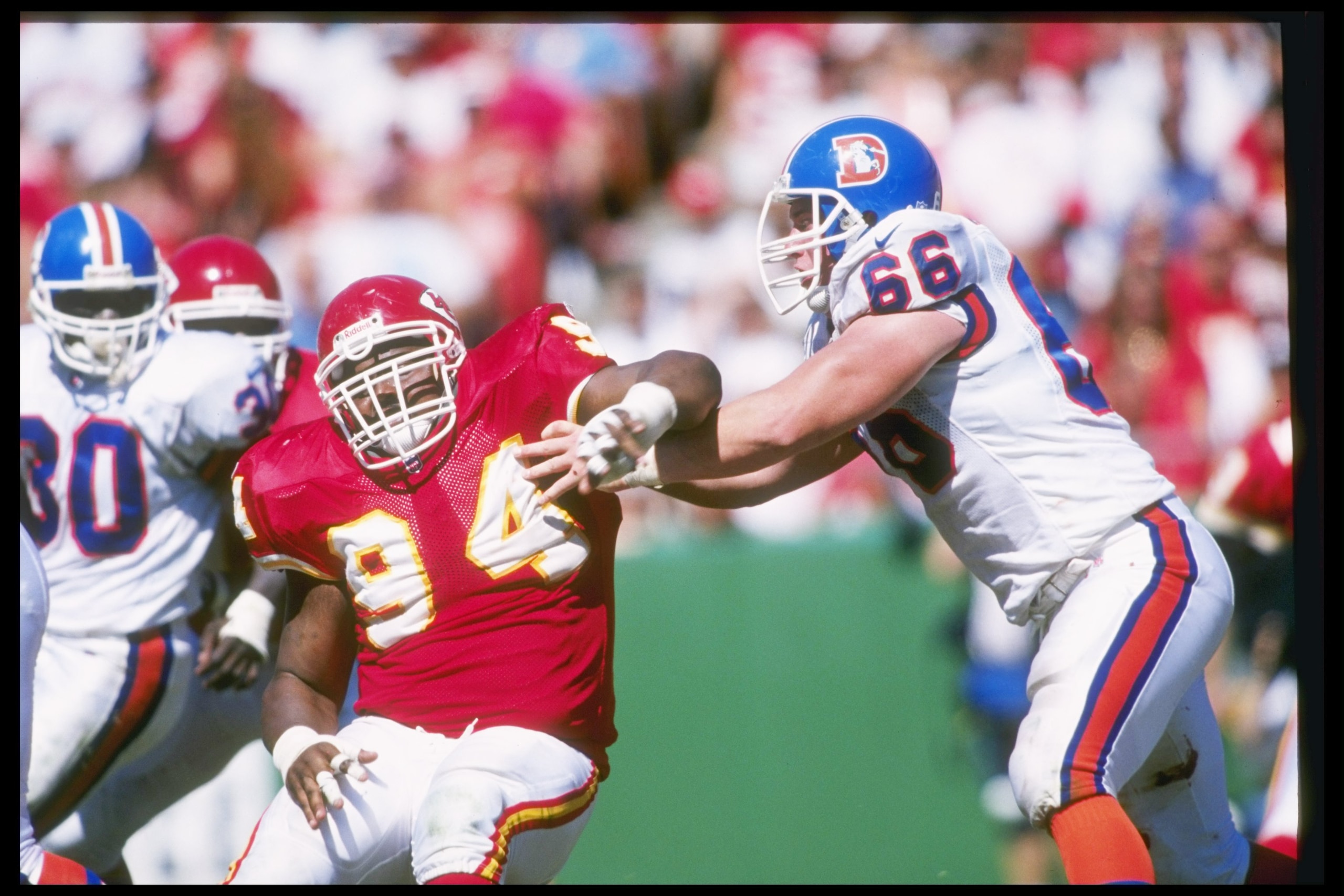 22 Sep 1996:  Offensive lineman Tom Nalen of the Denver Broncos (right) blocks Kansas City Chiefs defensive lineman Keith Traylor during a game at Arrowhead Stadium in Kansas City, Missouri.  The Chiefs won the game, 17-14. Mandatory Credit: Stephen Dunn